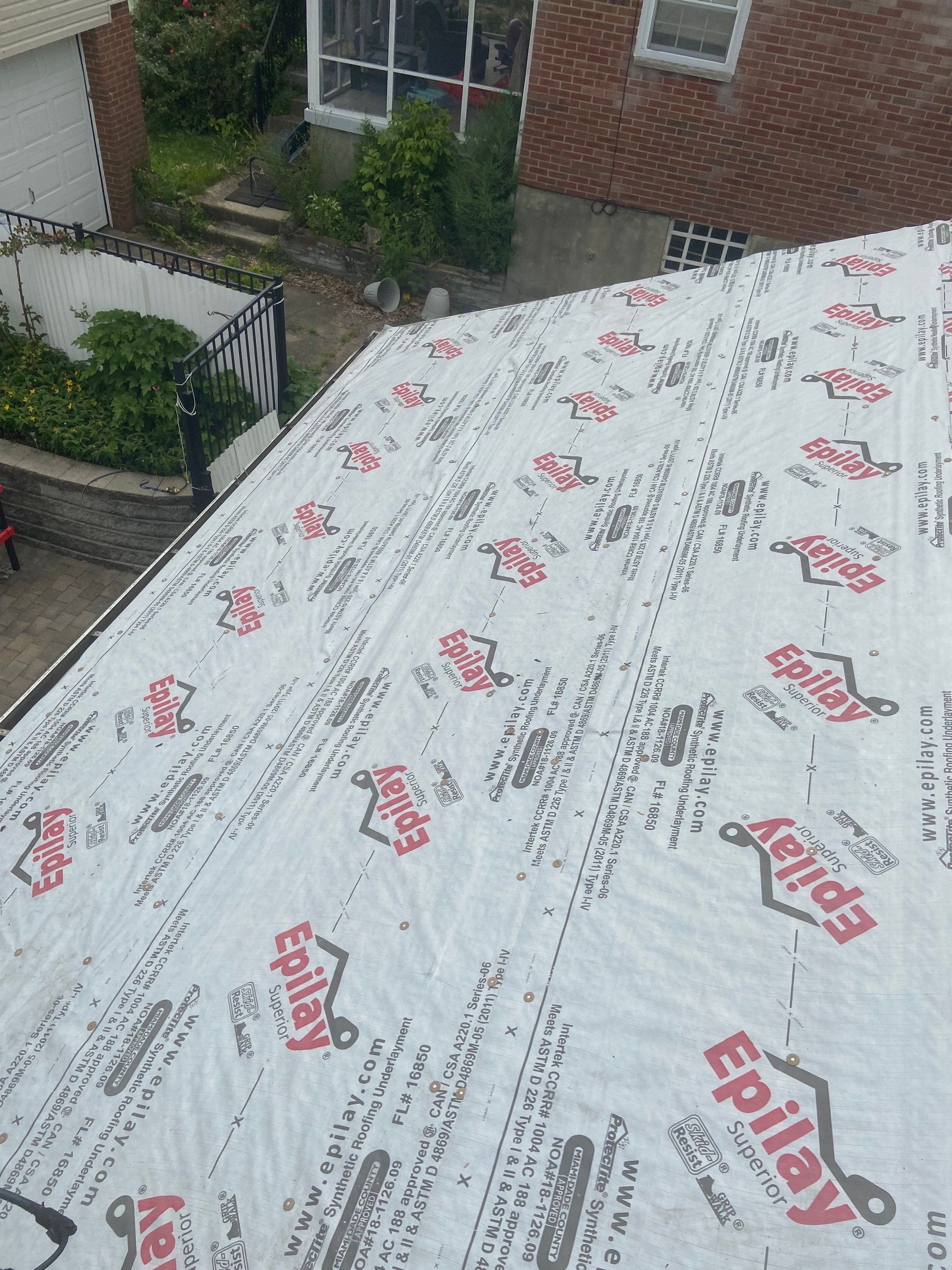 Metal Roofing, Skylights, Porch Build by Secure Construction Company Inc
