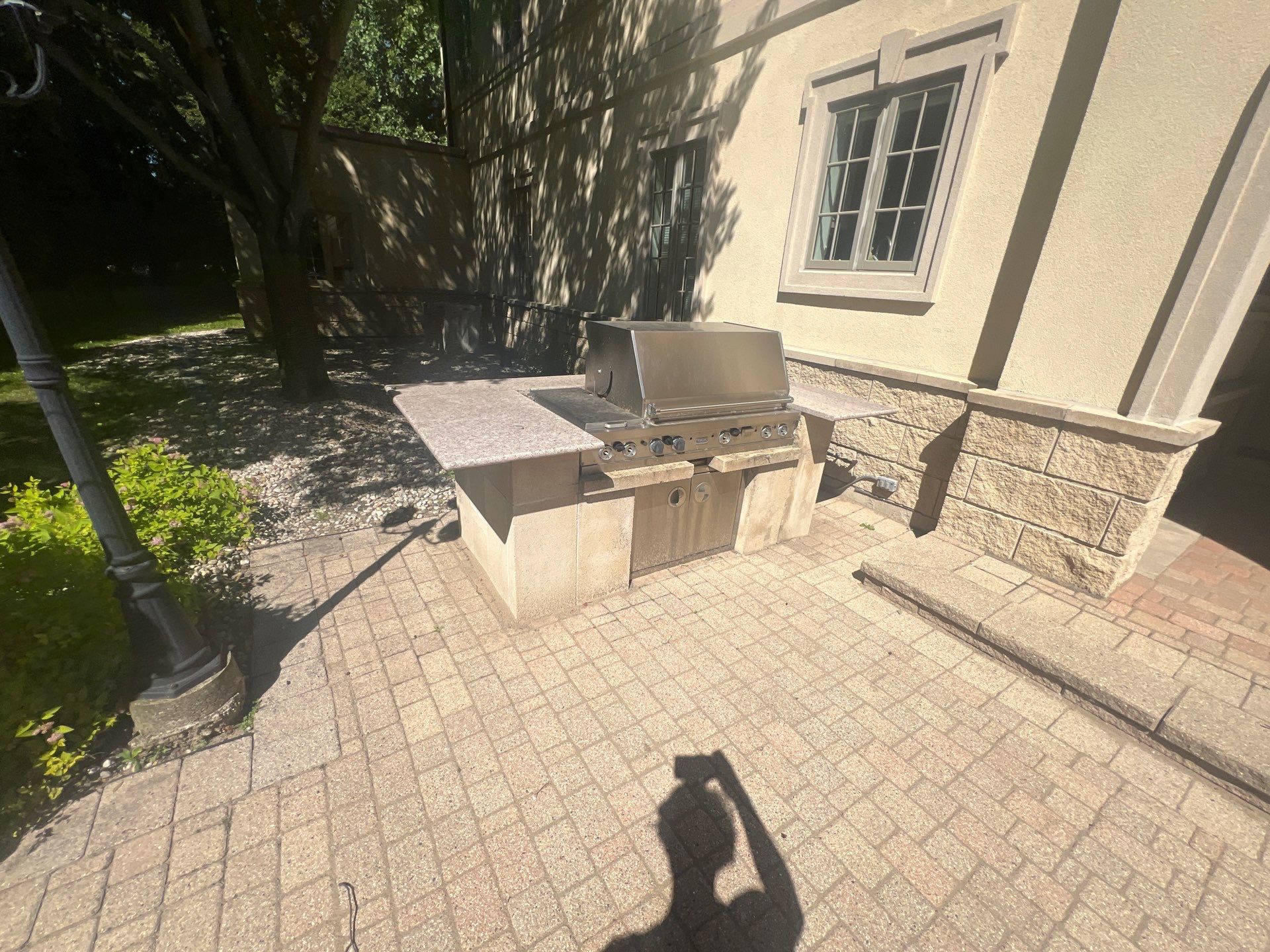 concrete cleaning using Algaecide, soft wash soap by Northern Power Washing LLC.