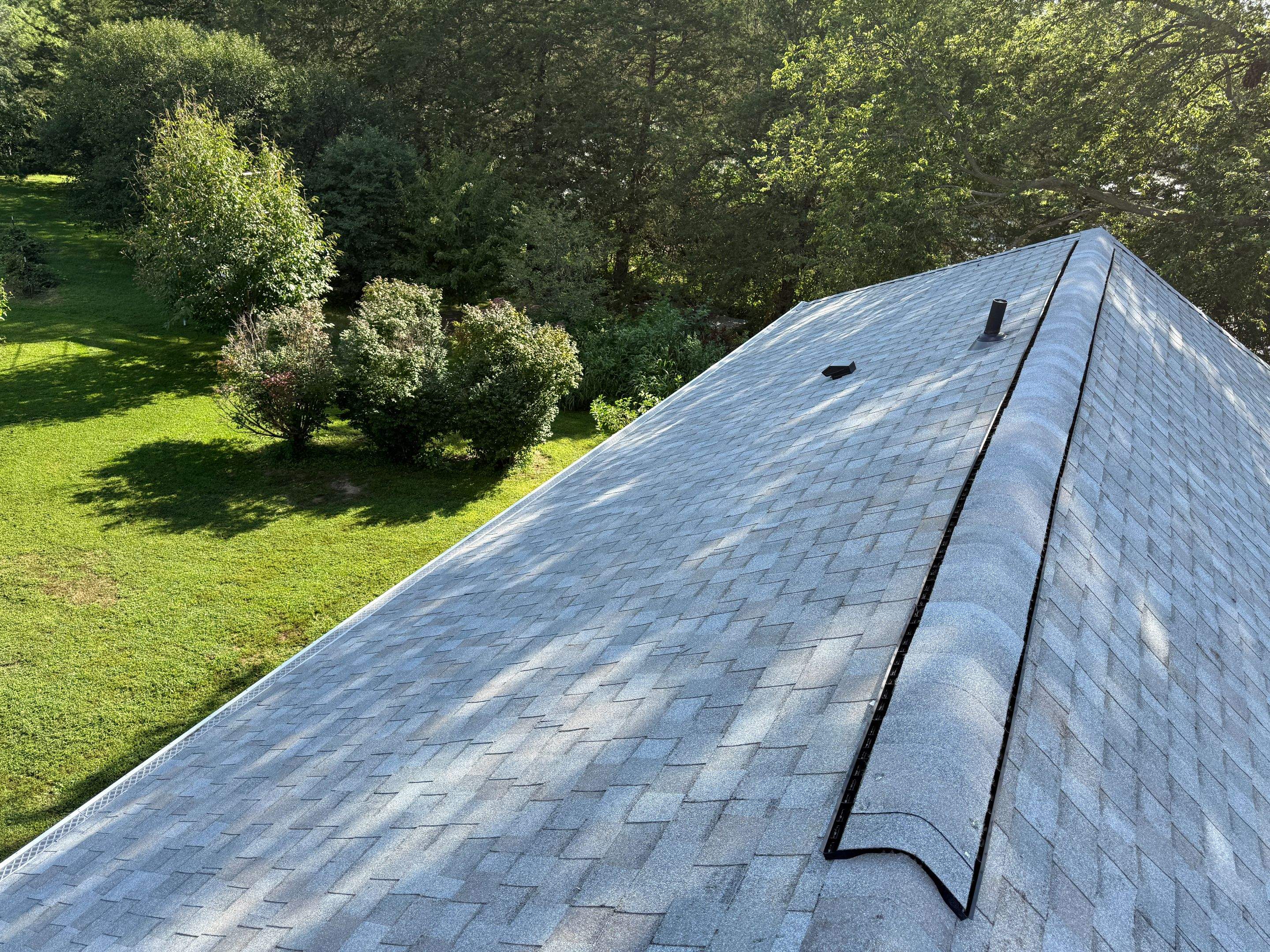 Asphalt Shingle and EPDM Membrane Roof Installation in Mineola by Star Home