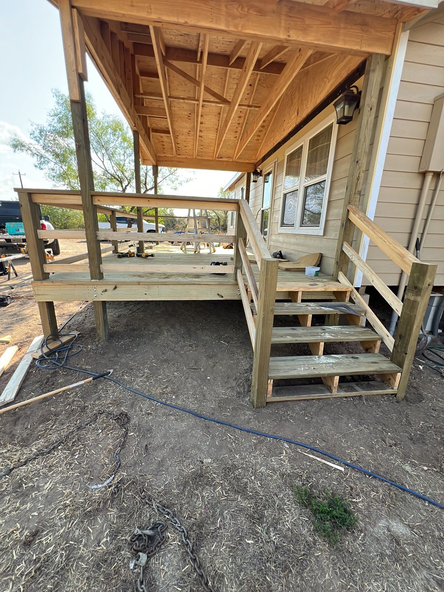Front Porch Sitt'n by Bayfront Roofing and Construction
