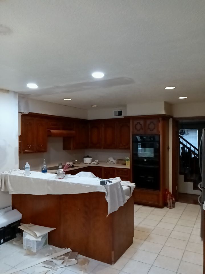 Interior and exterior painting project by Roof Concepts Construction