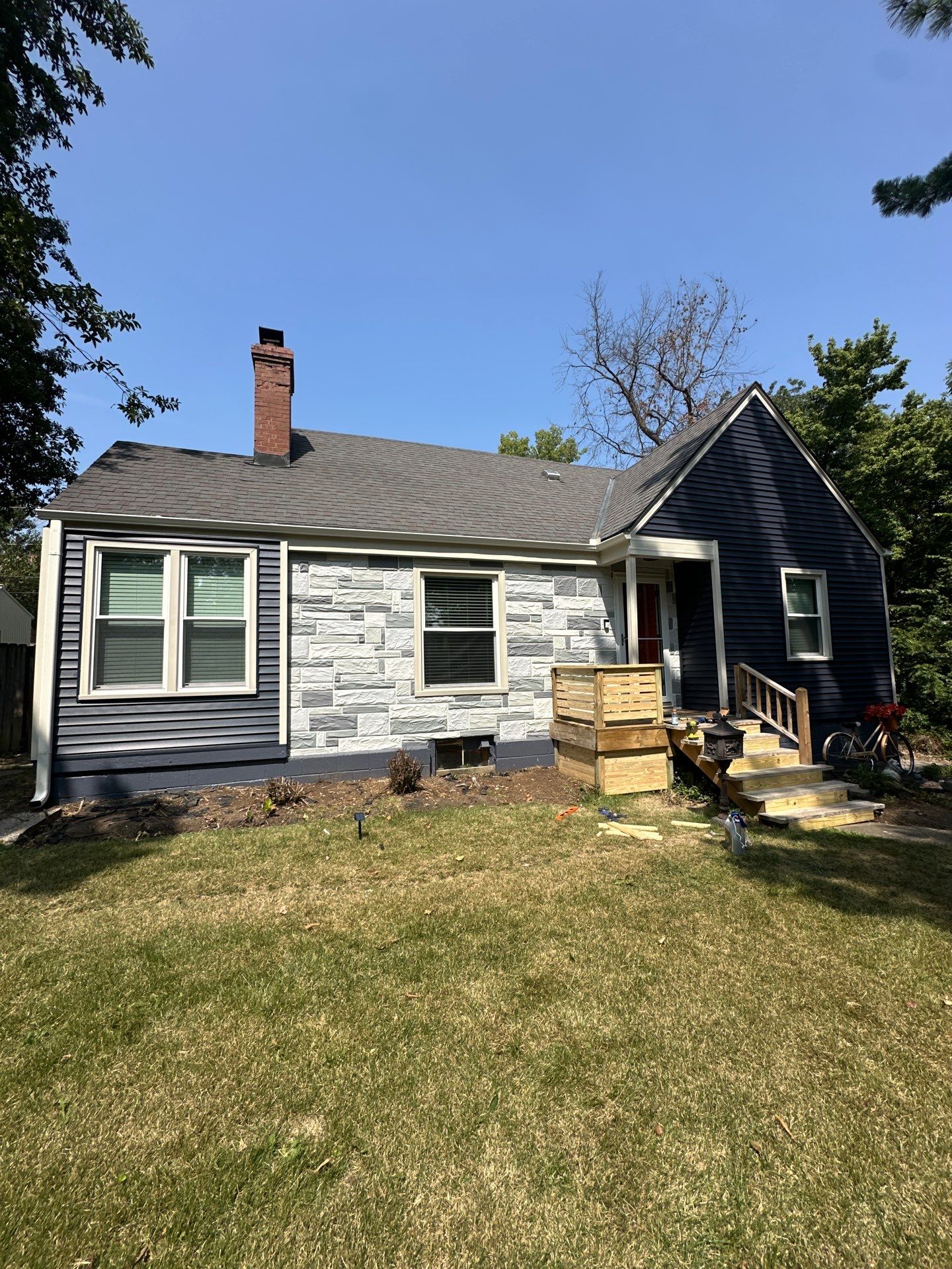 Kansas City Indigo Insulated Craneboard Siding and Window Replacement Project in Kansas City by EEC Windows, Siding & Roofing