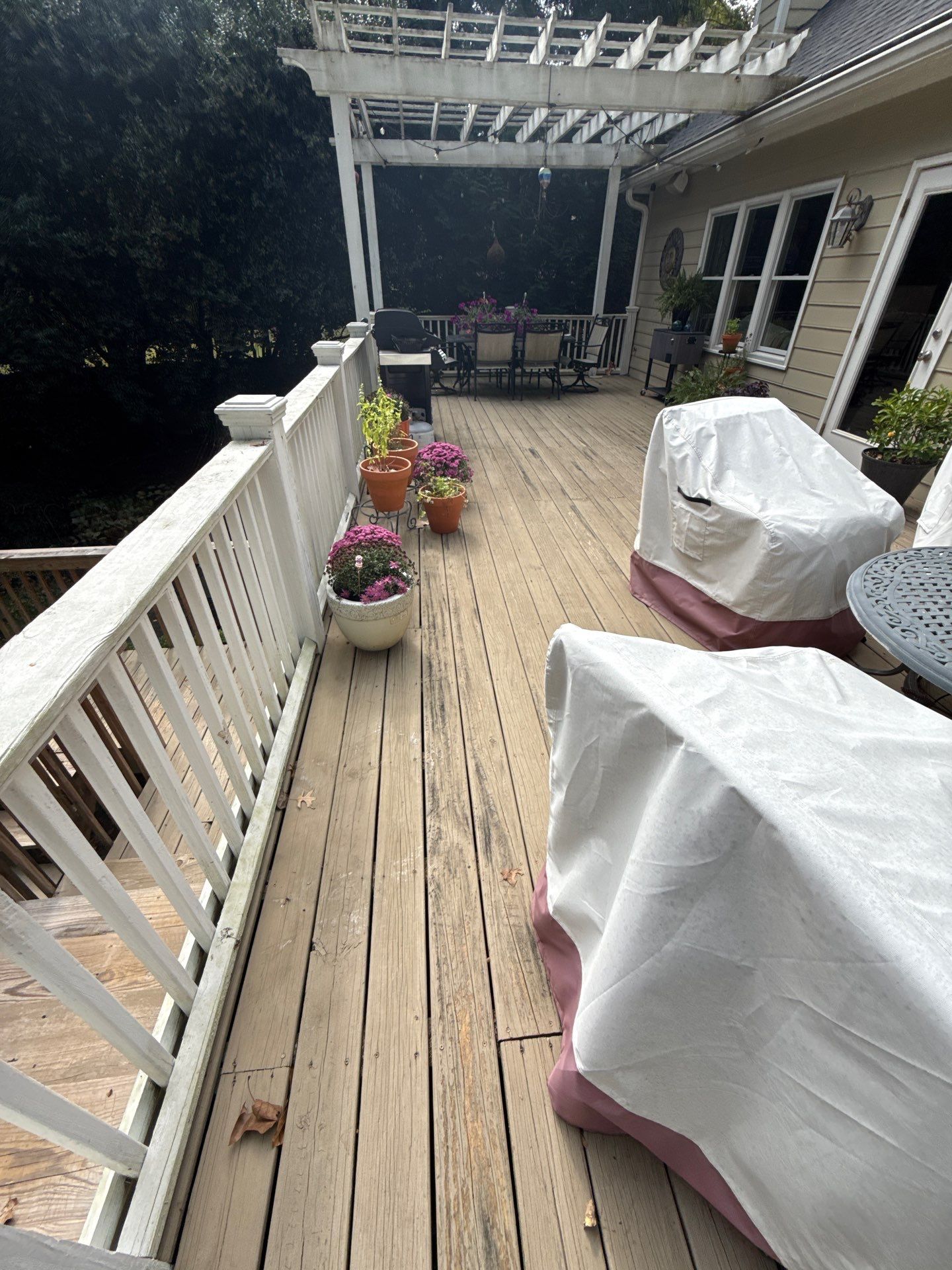 Deck Resurface and Screened-In Porch Build with Timbertech LED Lantern Post Cap Lights by Nelson Exteriors