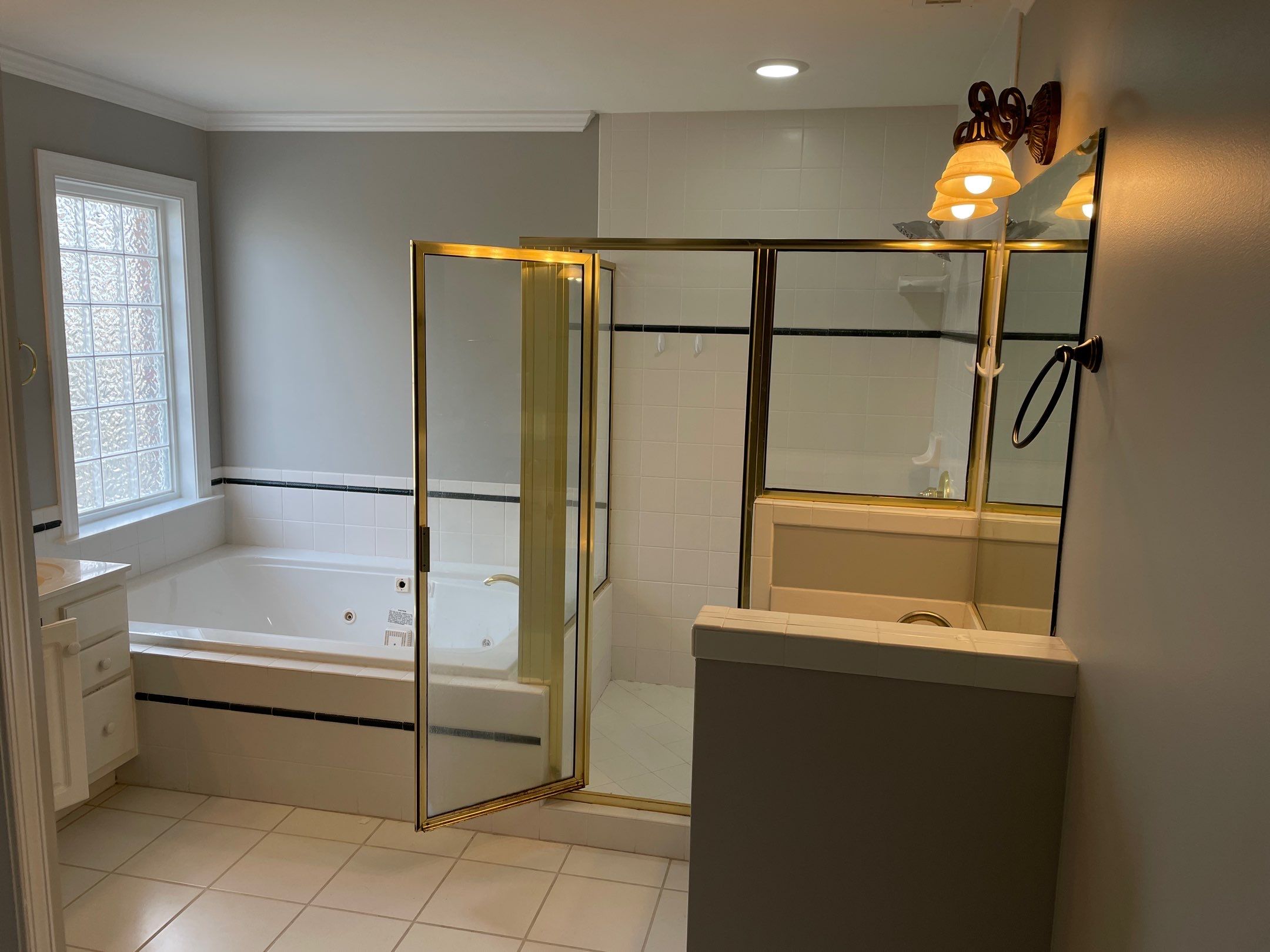 Bathroom Remodel using Schluter by Footprints Floors of Coastal Carolina