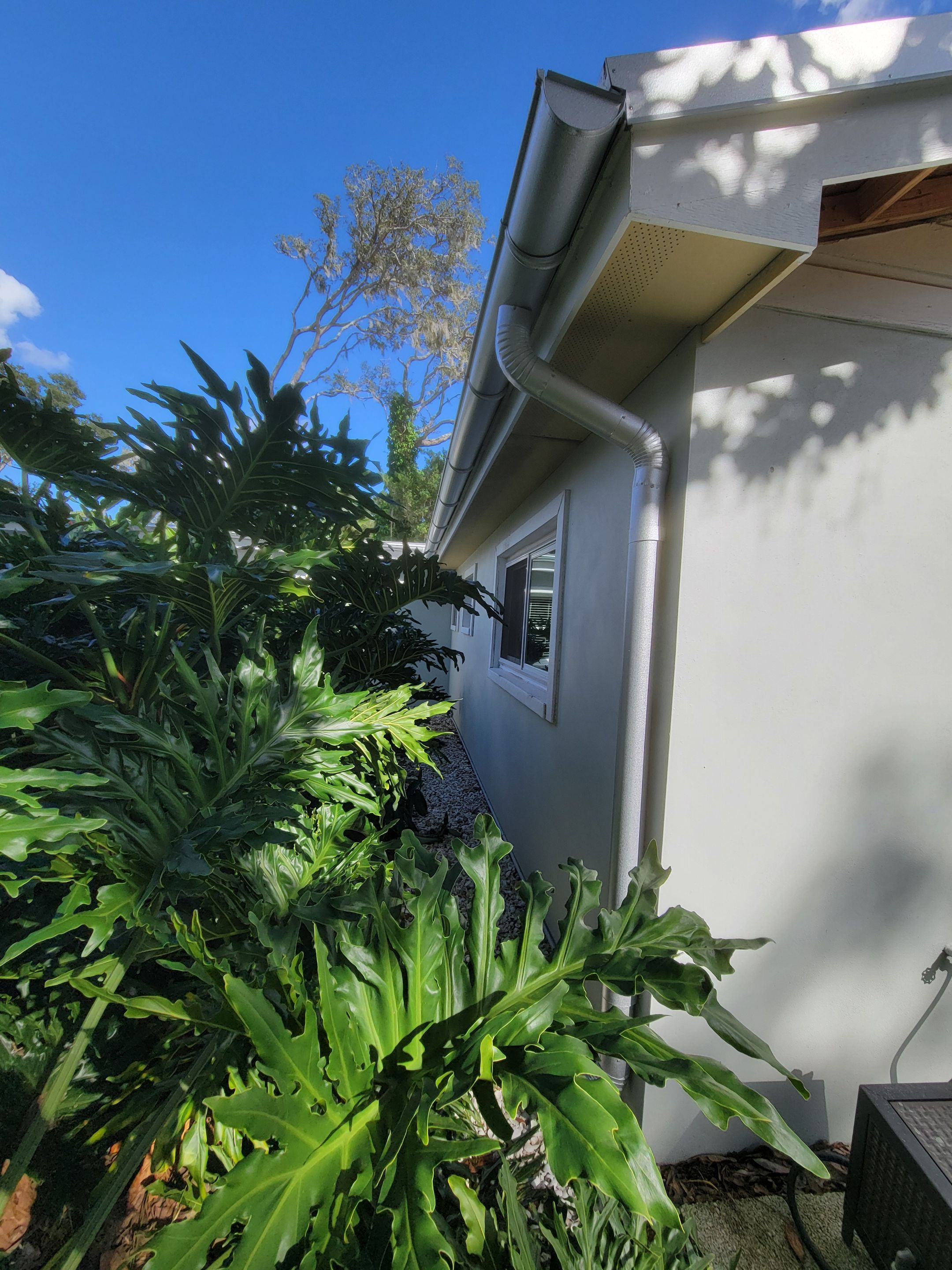 Galvalume Half Round Seamless Gutters and Downspouts in Valrico FL by Gutter Professors