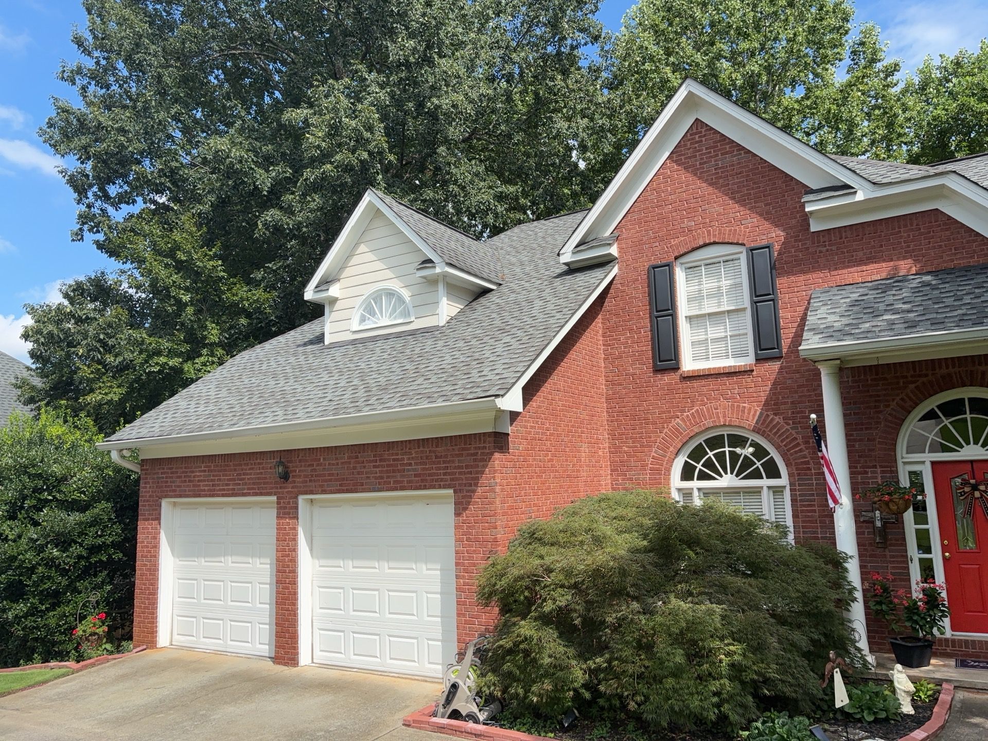 Blue Exterior Paint and Siding Installation using James Hardie Lap Siding by Nelson Exteriors