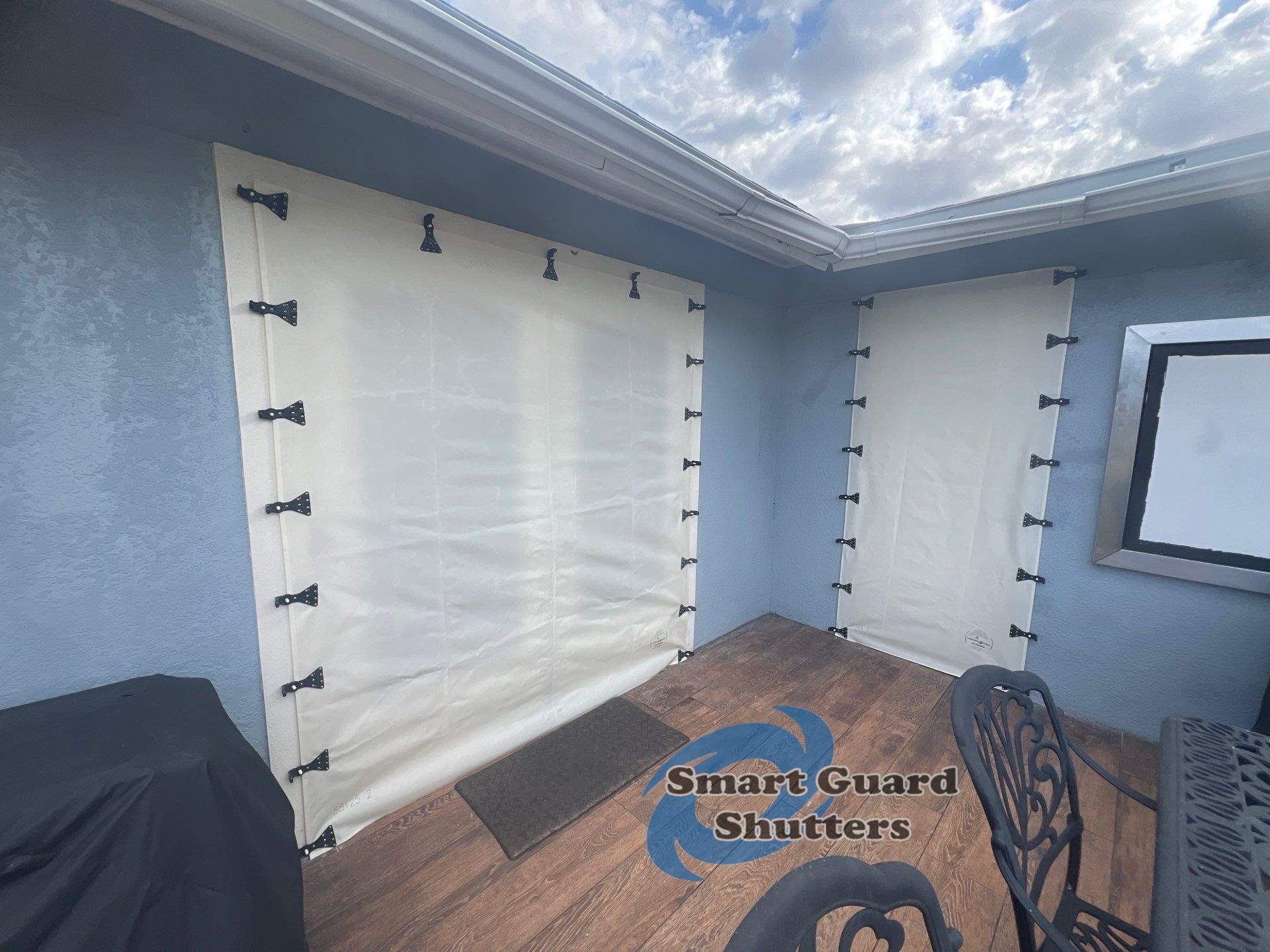Hurricane Protection in Blue Grey by Smart Guard Shutters