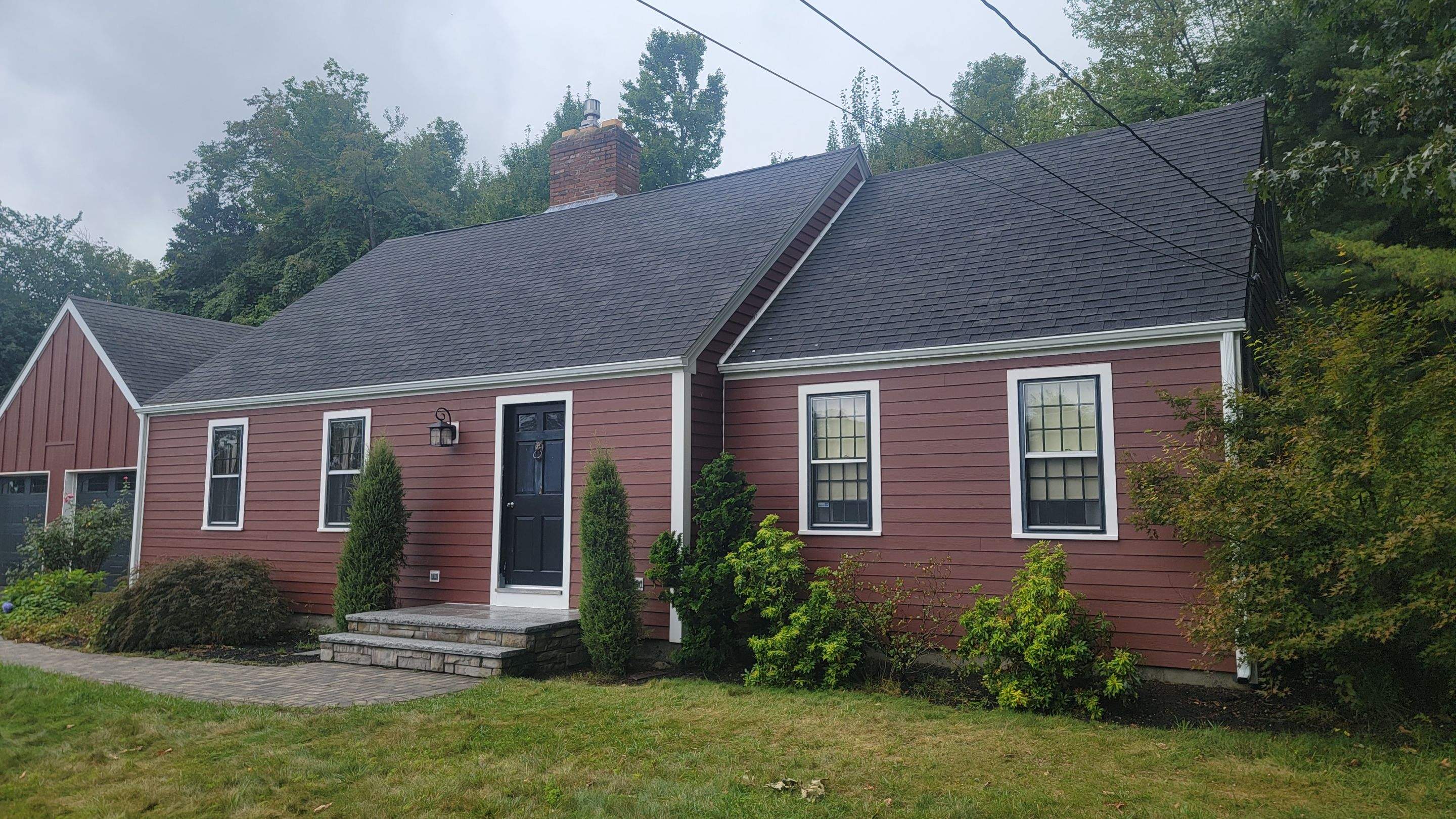 Siding Installation using James Hardie Countrylane red by UBrothers Construction