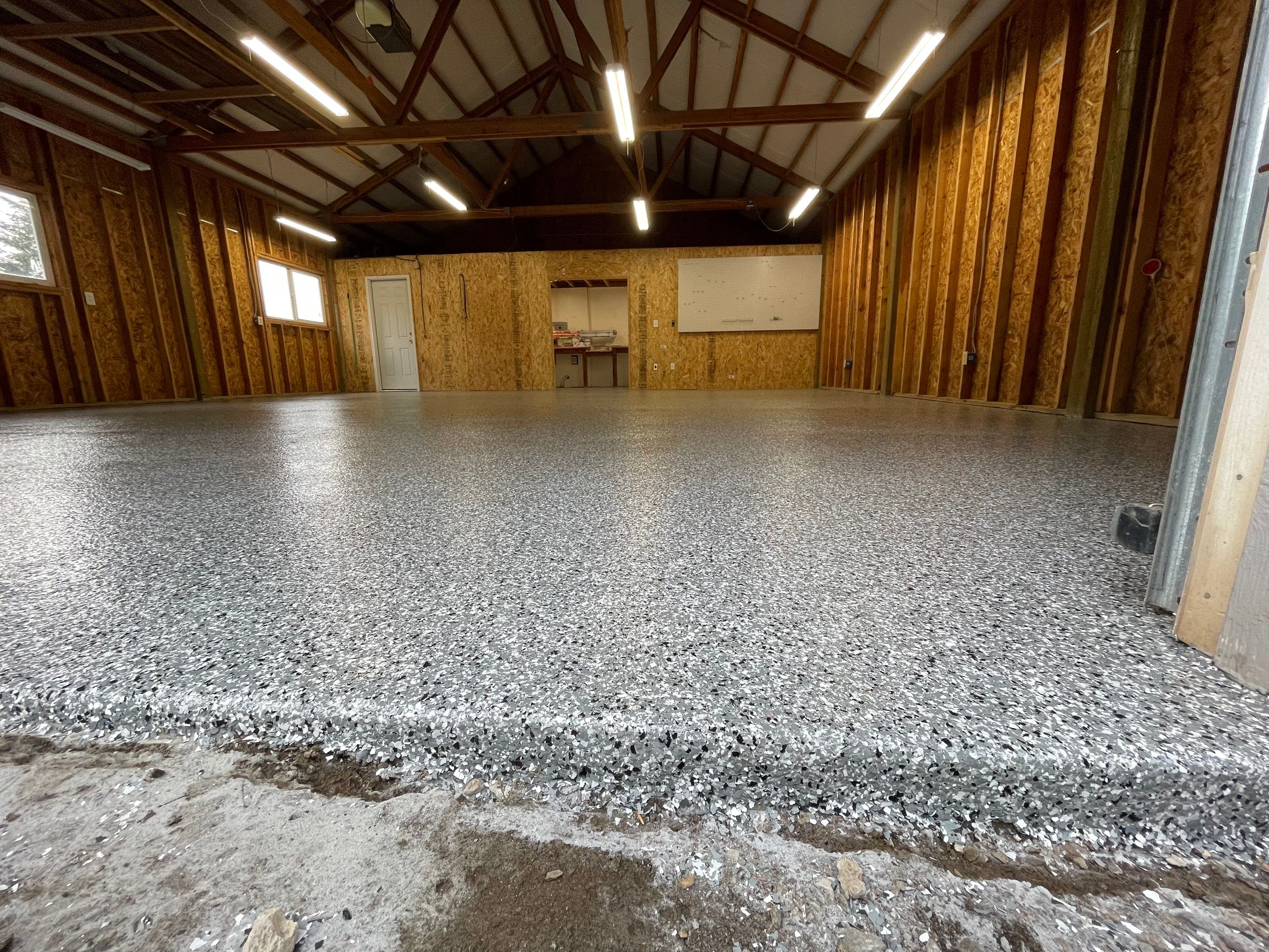 Garage Transformation using Penntek Evolution System and Smoke Color by Croc Coatings, LLC