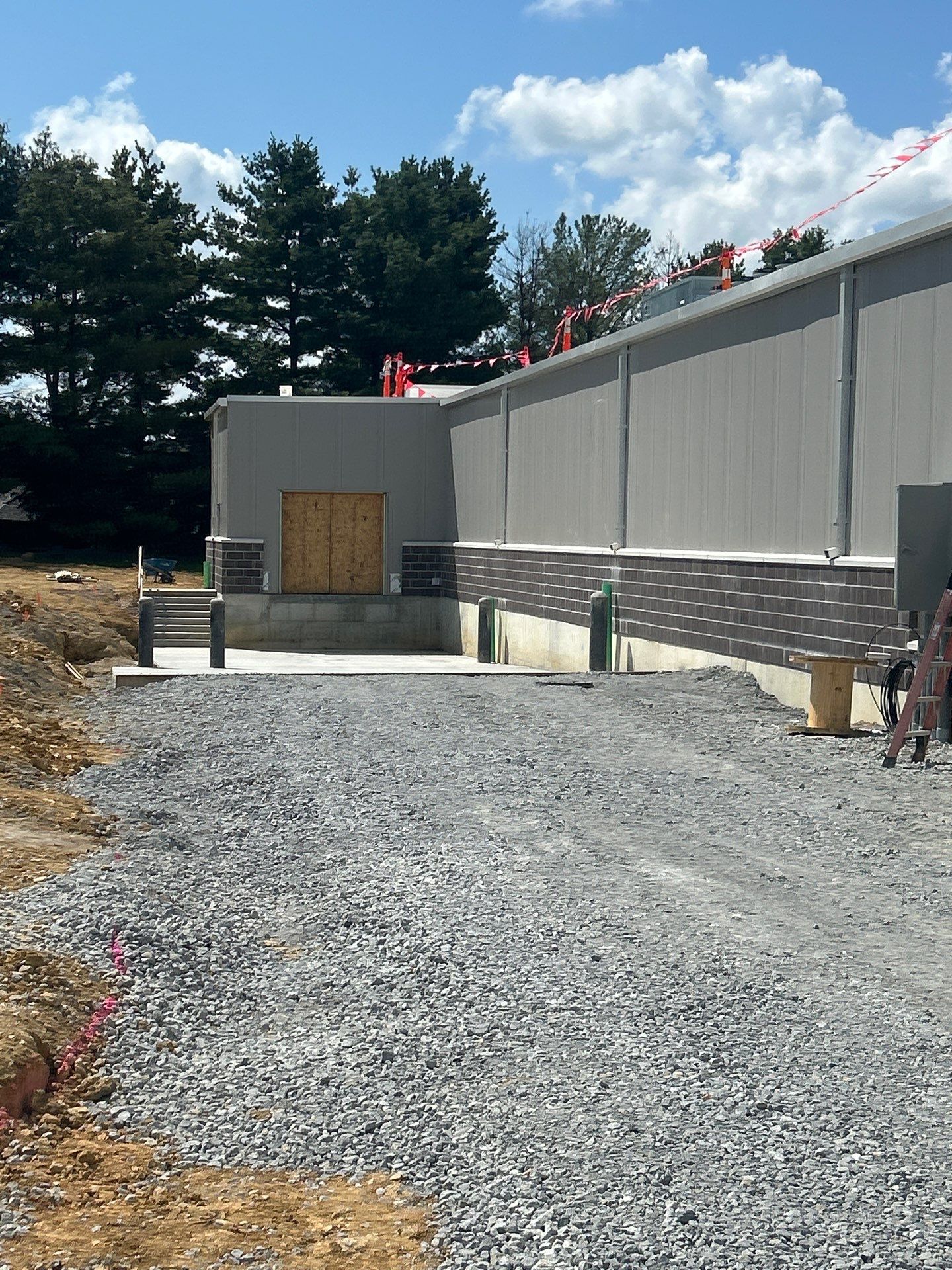 Commercial Siding  using Insulated roof and wall panels by Nitro Roofing and Construction