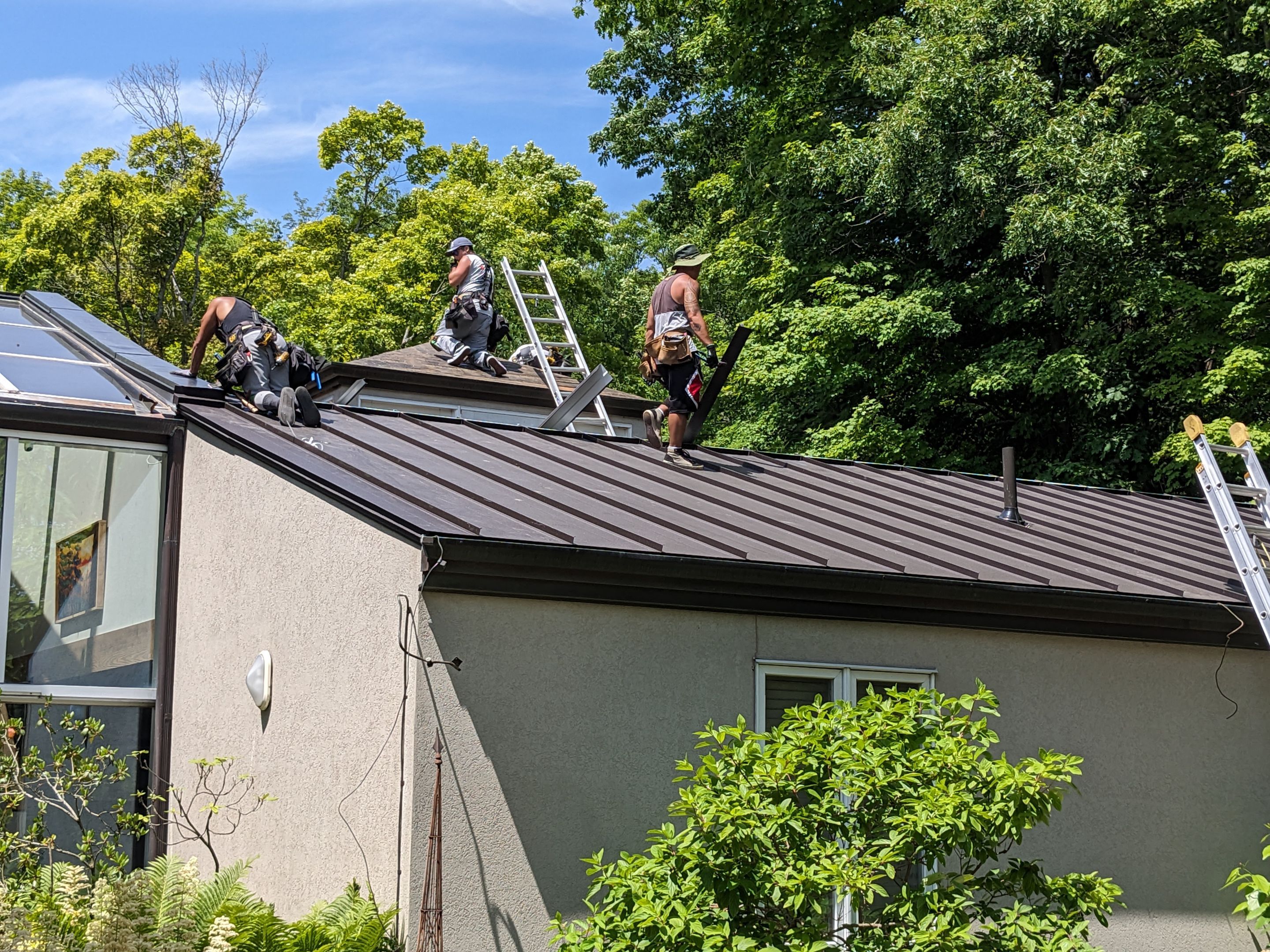 Roof Replacement using 16" Standing Seam Panels by Jay Carter Roofing & Sheet Metal