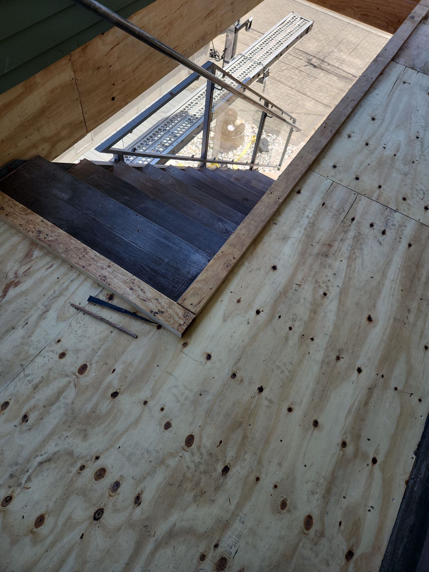 Deck Installation using Tanzite Stone Decking by A Plus Exterior