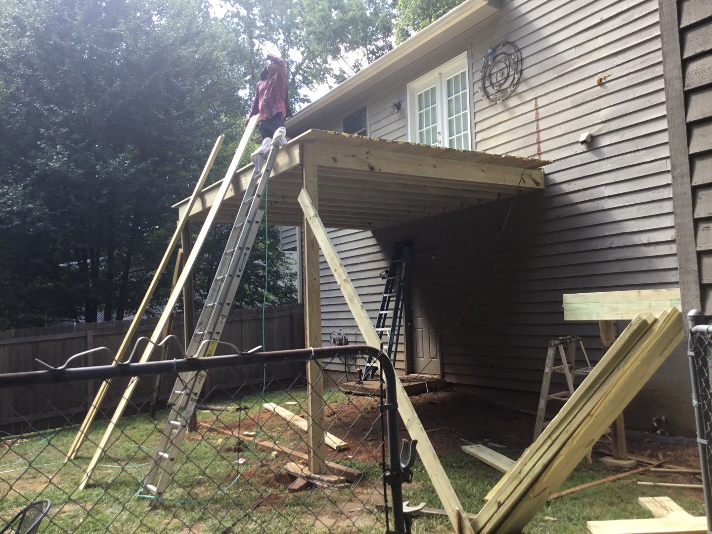 Elevated Wooden Deck and Front Porch Renovation in Marietta by Swift Home Renovations 