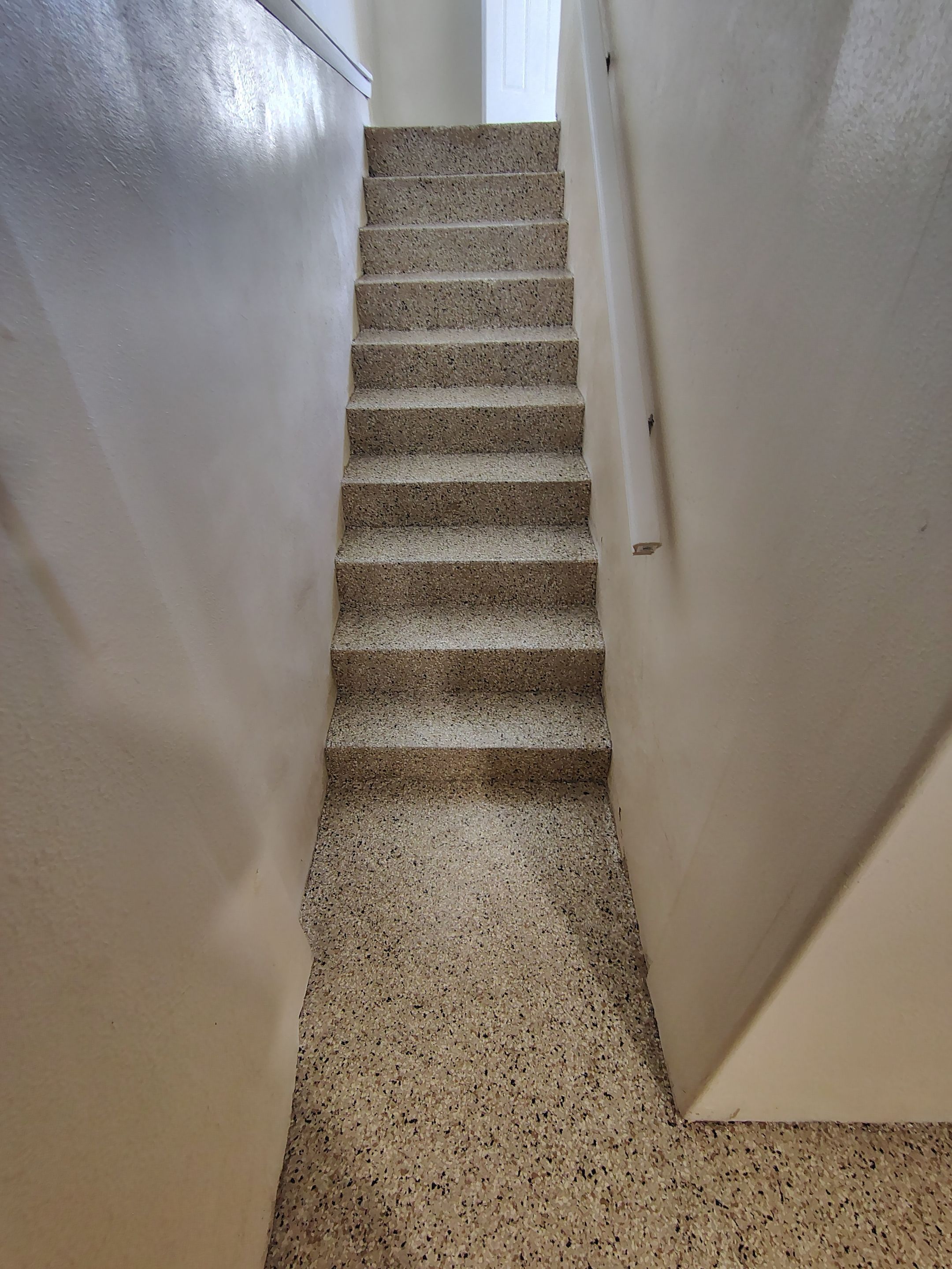 Comprehensive Basement Concrete Floor Coating and Crack Repair in Sioux Falls by Select Painting, Coatings & Garage Cabinets