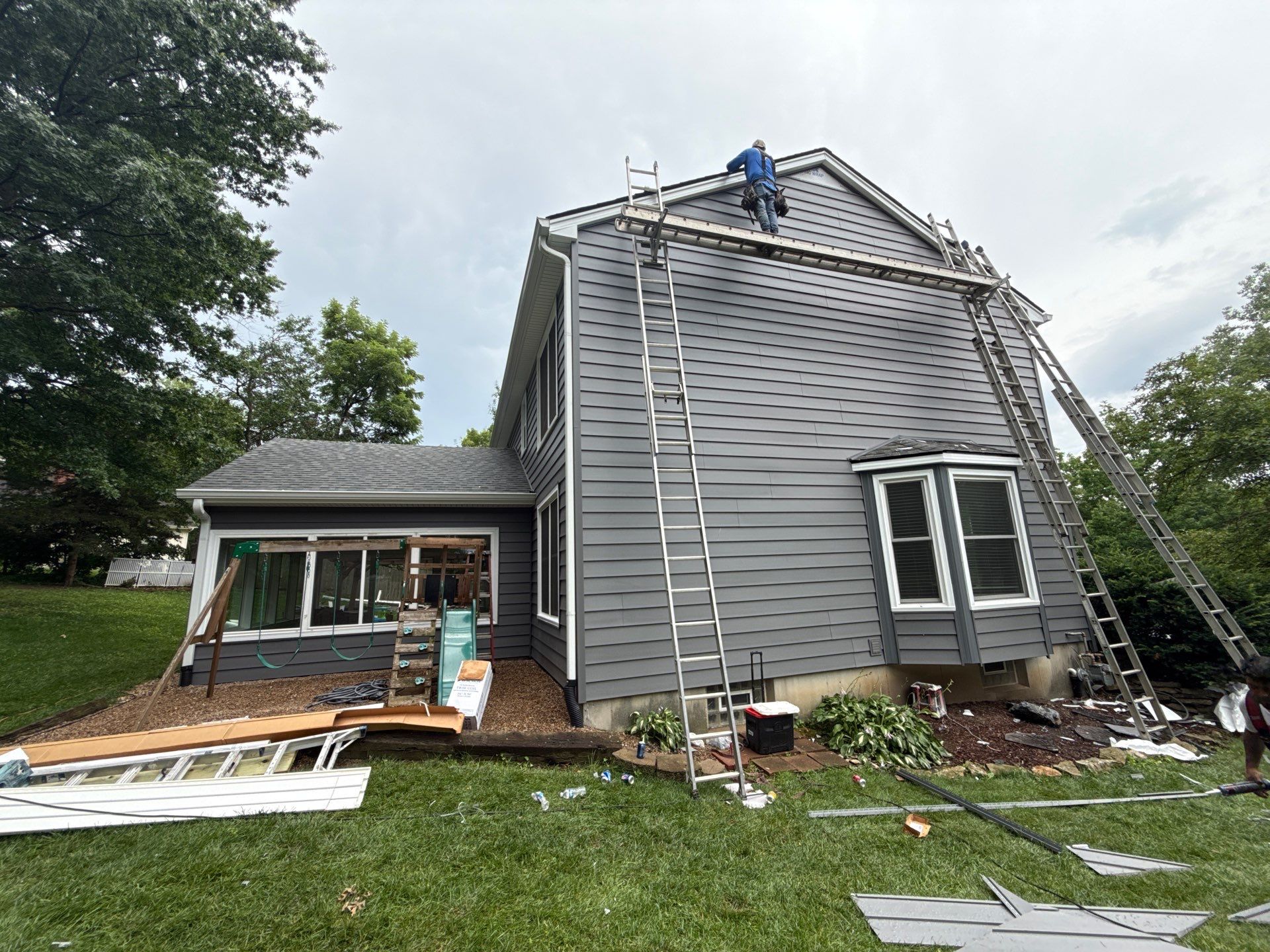 Full Exterior Siding Upgrade and Board and Batten Installation in Shawnee by EEC Windows, Siding & Roofing