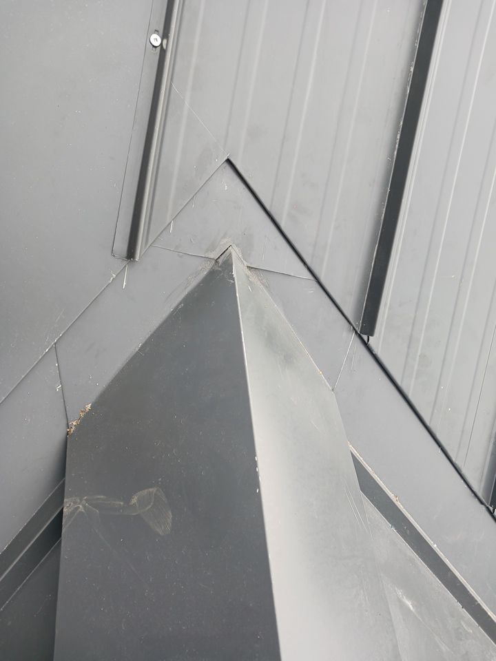 Residential Roofing Installation using 12" Prolok metal by Top Notch Roofing Inc