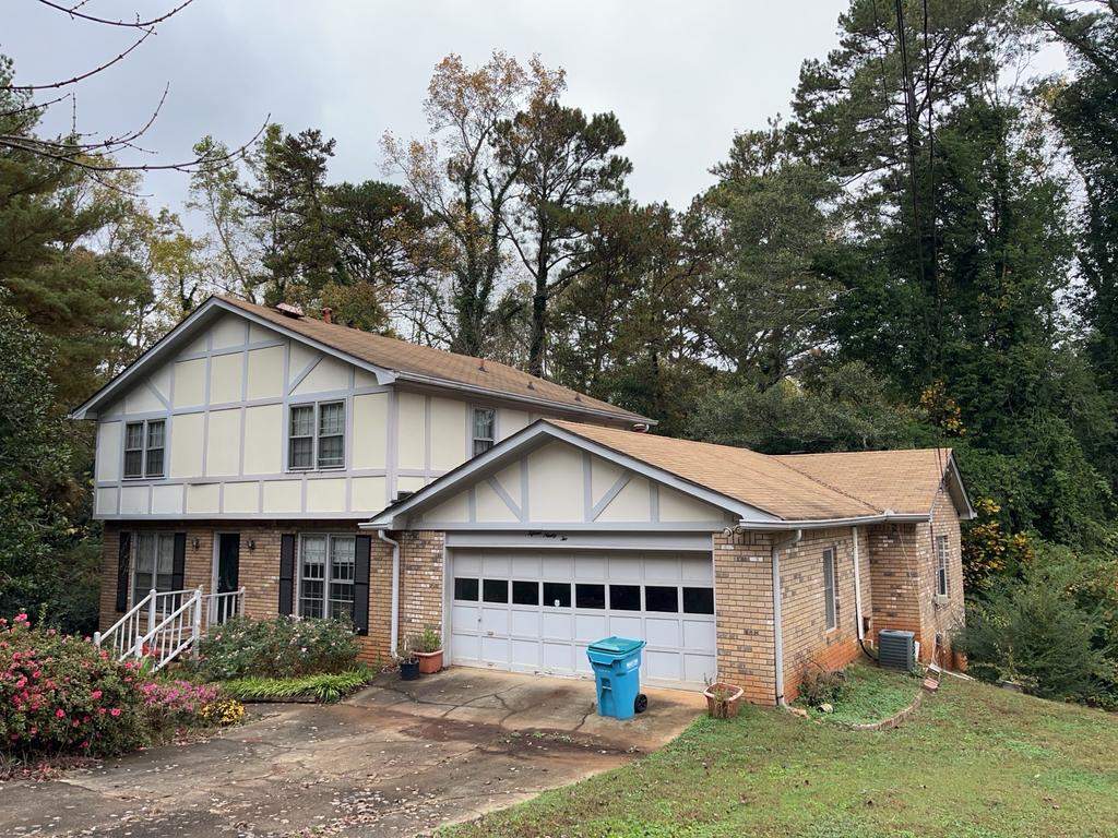 Board and Batten Siding Installation and Railing Replacement in Lilburn, GA by Nelson Exteriors 