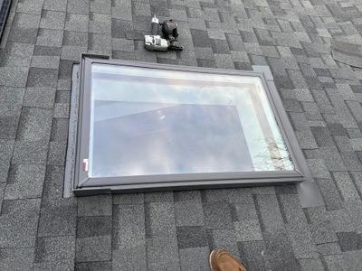 Six Squares of Owens Corning Shingles, and a Velux Skylight in New Castle, NH