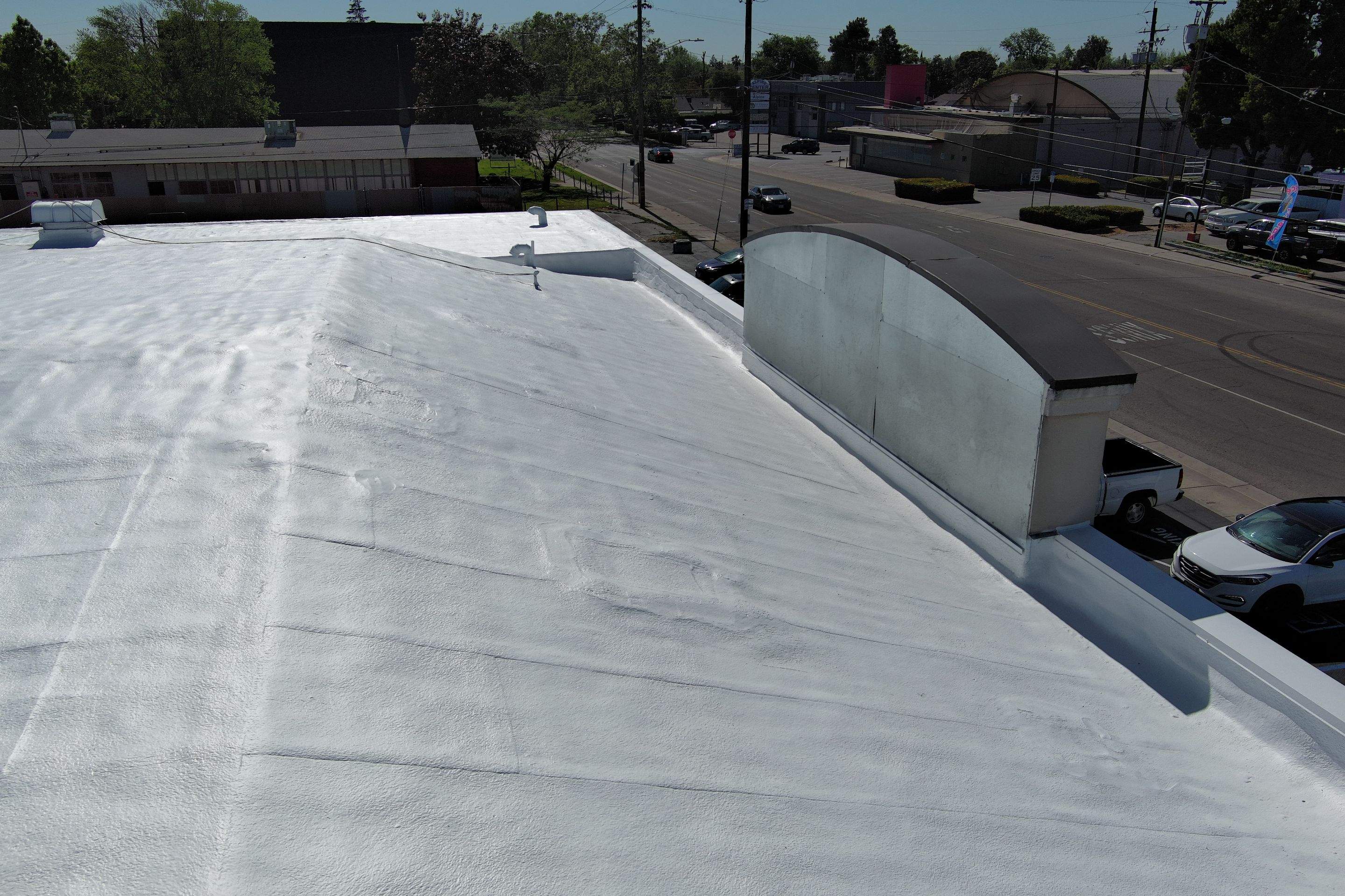 Foam Refurbish using Conklin Benchmark/PUMA XL coatings and spray foam by Straight Edge Roofing Inc