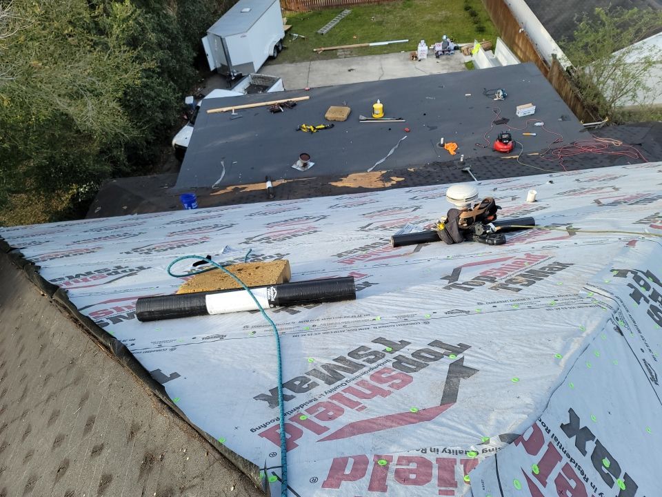 Residential Roofing Installation using Roof Replacement by American Roofing & Construction LLC