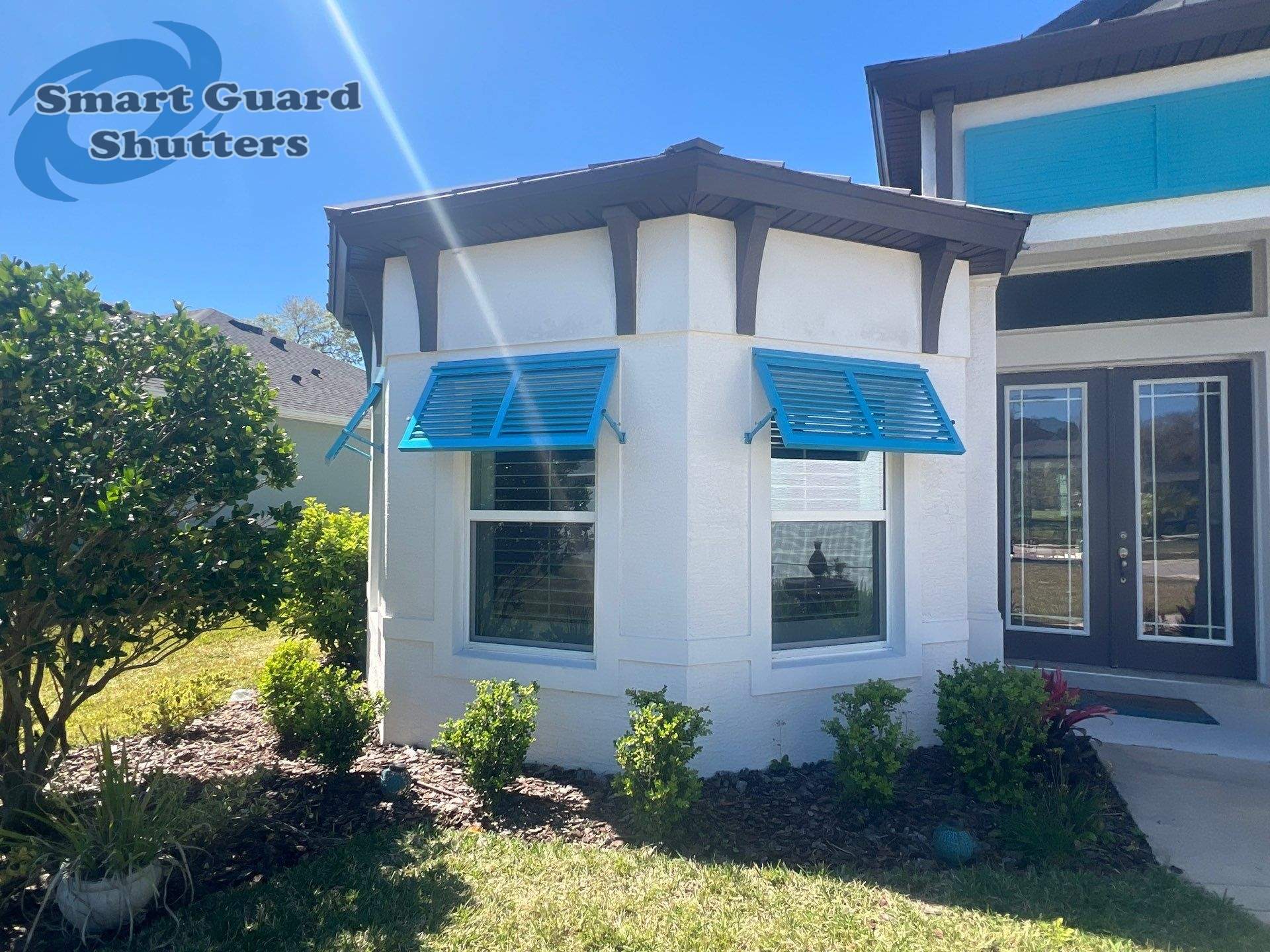 Decorative Bahamas in Throw Back Blue  by Smart Guard Shutters