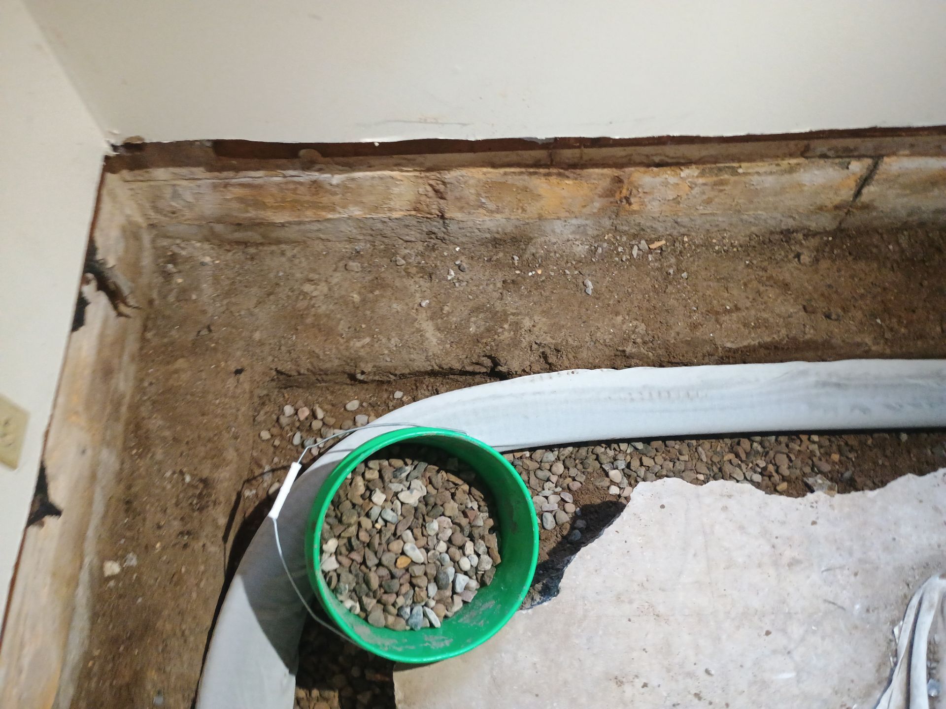 Completing the Connection for Lisa's Drain Tile System by Waterproofing Northeast