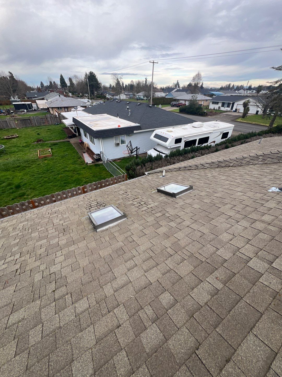 Residential Roofing Installation using IKO Dynasty (Color: Granite Black) by Orezona Building & Roofing Company, Inc.