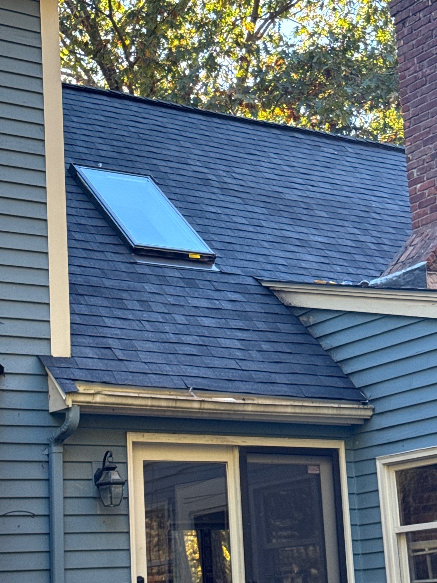 Milford Complete Roof Replacement with Velux Skylight Upgrade by Mighty Dog Roofing of Greater Middlesex County