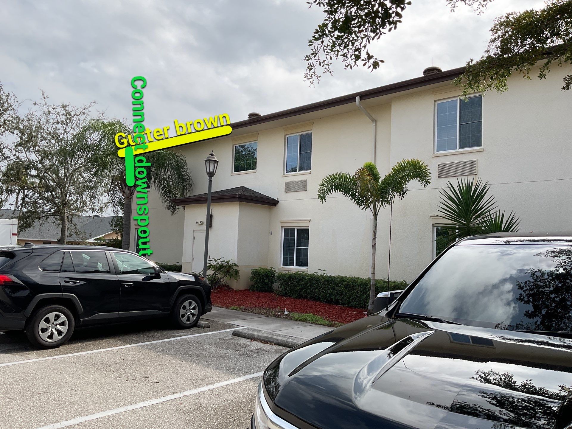 Musket Brown Seamless Gutters using Musket Brown Seamless Gutters in Capen Coral FL by Gutter Professors