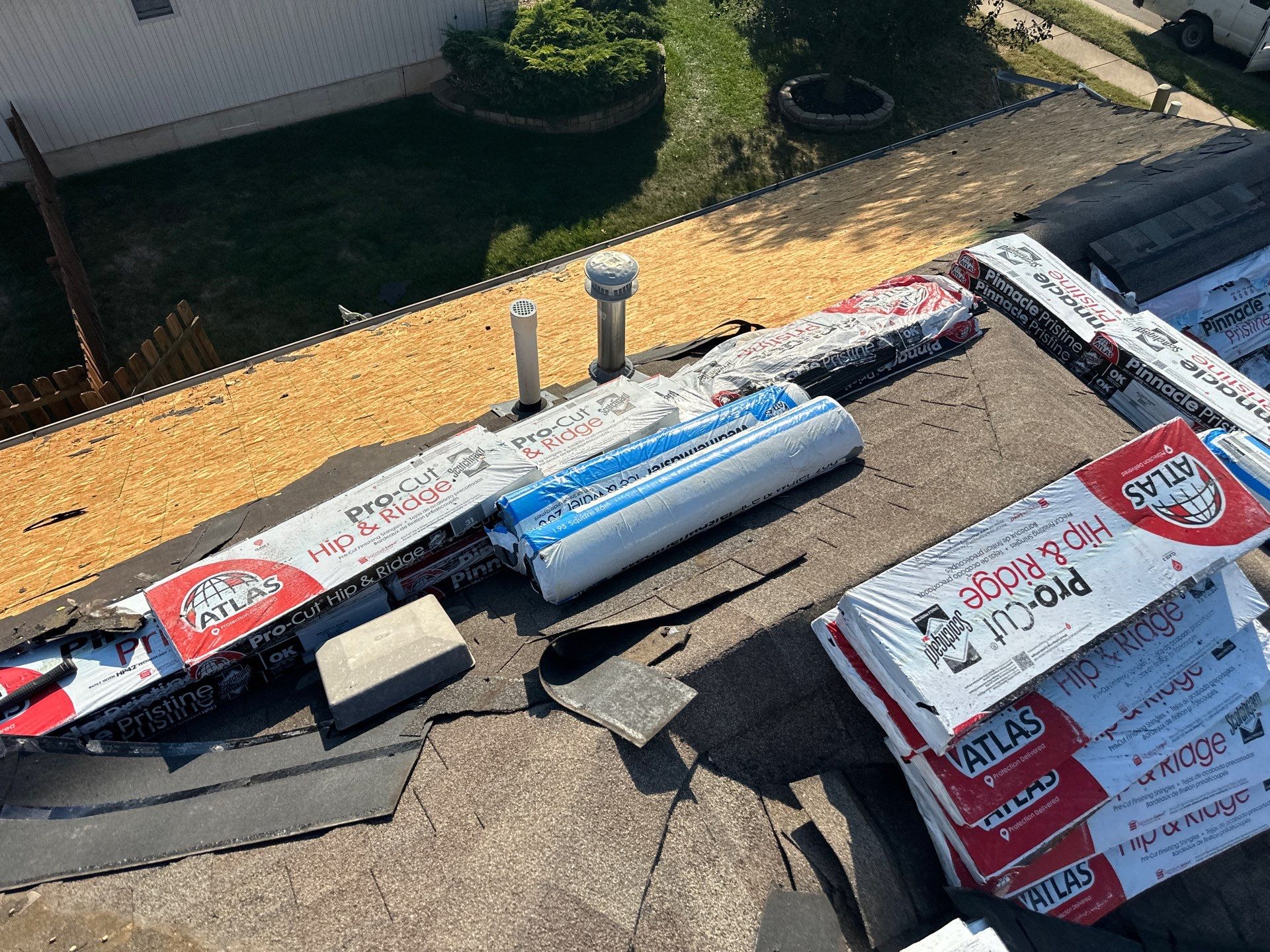 Residential Roofing + Downspouts & Gutter Guards Install  by Titan Commercial & Residential Roofing 