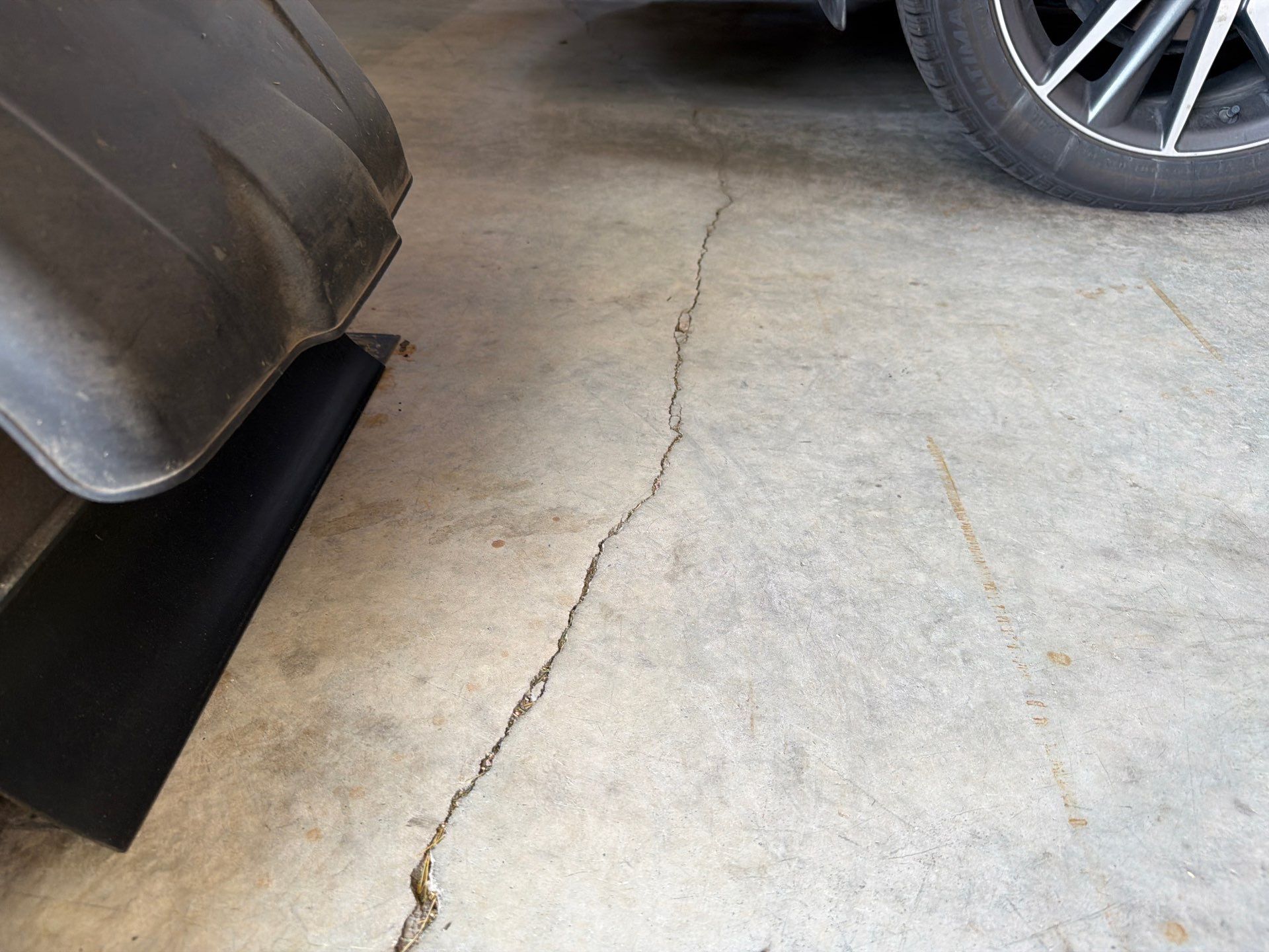 Multi-Car Garage Floor Coating and Crack Repair in Tea by Select Painting, Coatings & Garage Cabinets