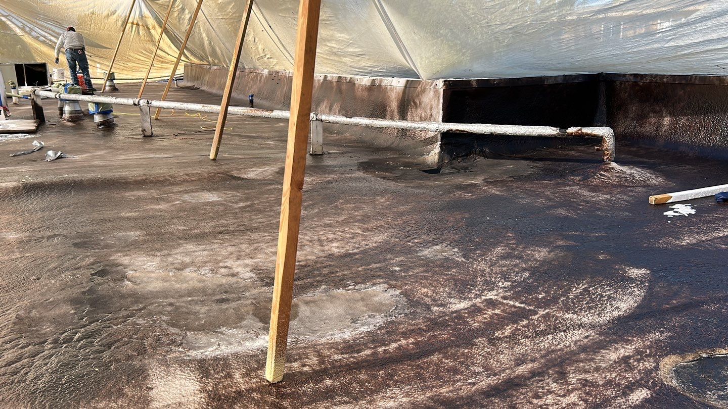Foam Refurbish using Conklin Benchmark/PUMA XL coatings and spray foam; Also metal roofing around parapet wall by Straight Edge Roofing Inc