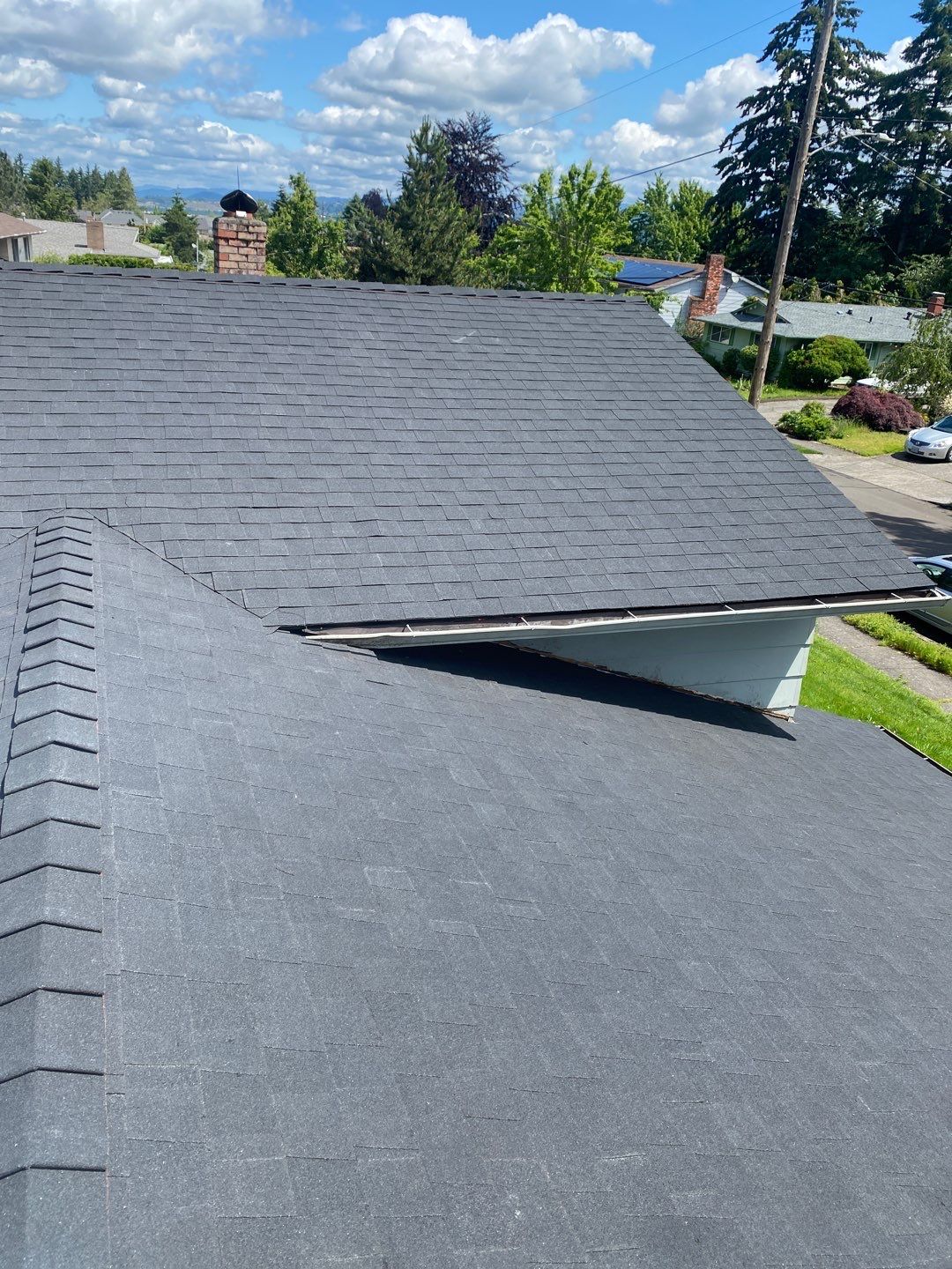 Onyx Black Shingles by Reimagine Roofing