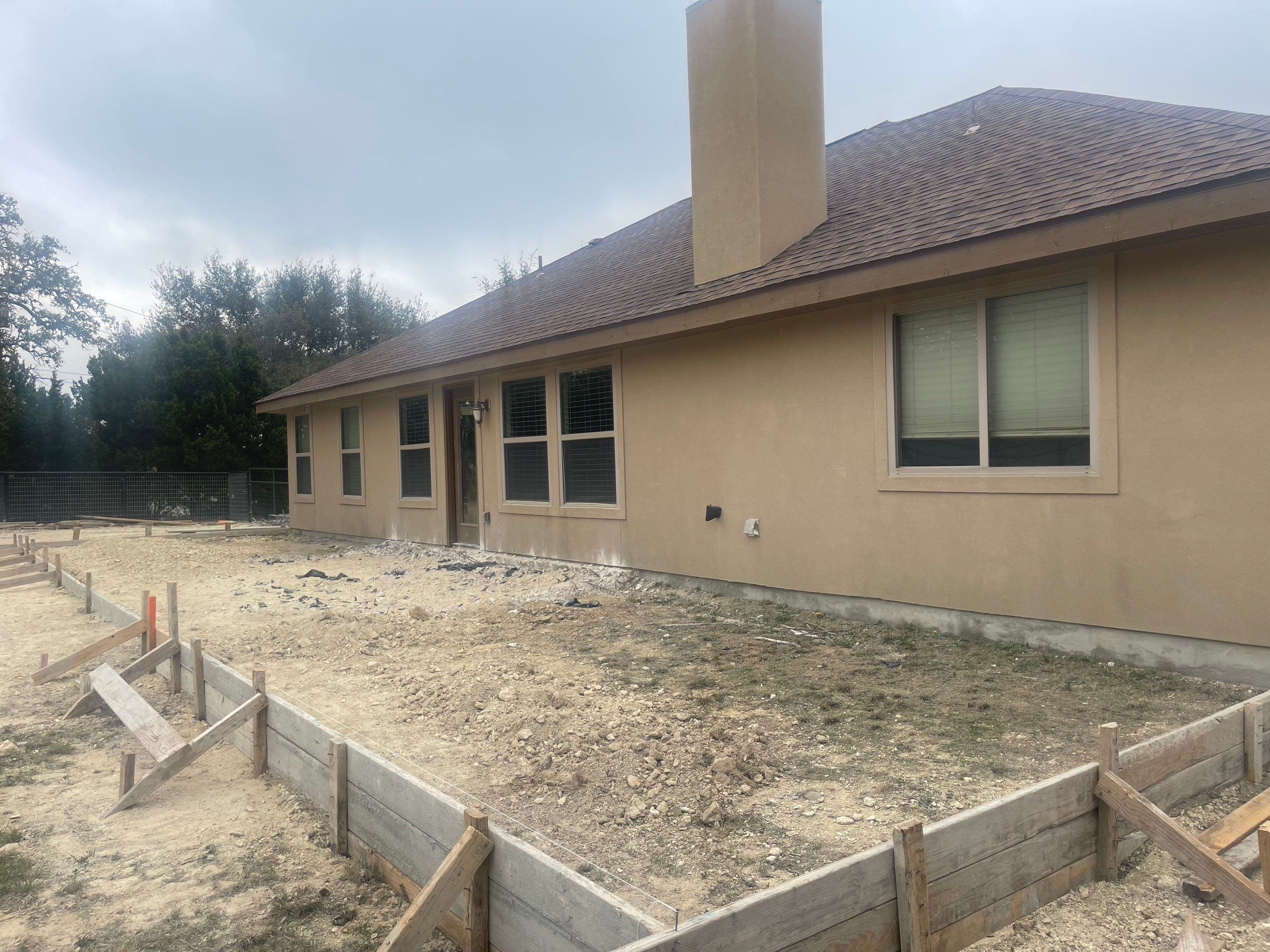 Reroof with Back Patio Addition using Owens Corning Duration Aged Copper by Lightning Exteriors