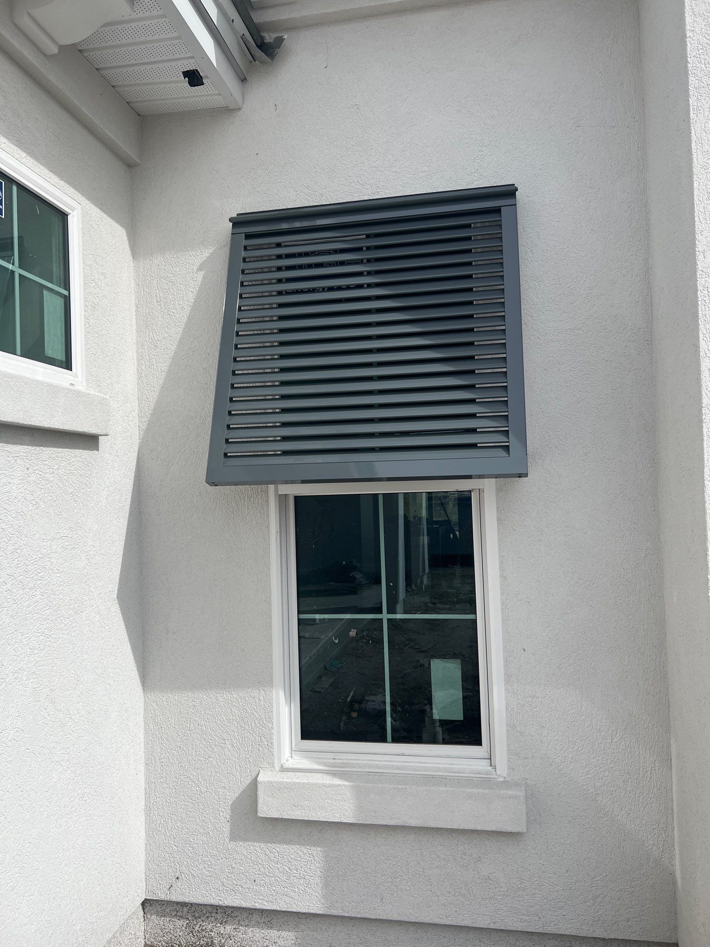 Bahama Shutters in Basalt Grey by Smart Guard Shutters