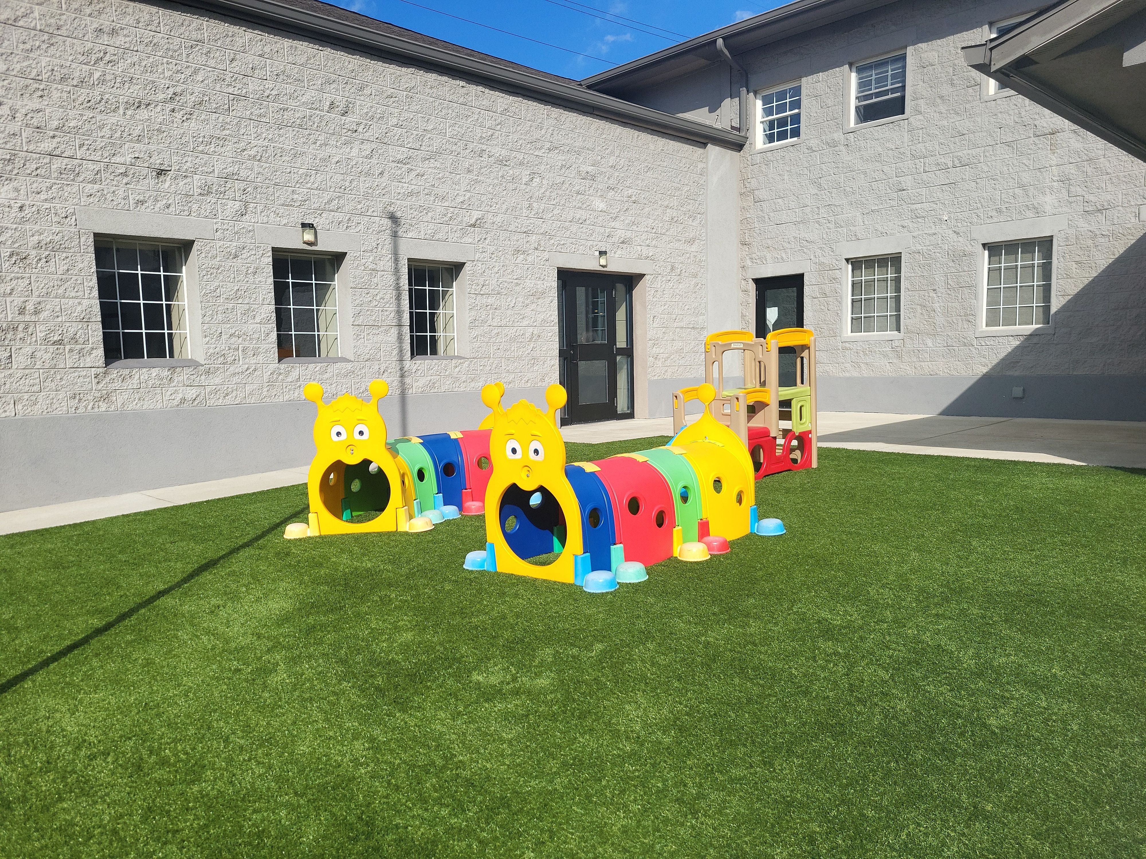 Indianapolis Child Care Center Playground Synthetic Turf Installation by Southwest Greens Midwest