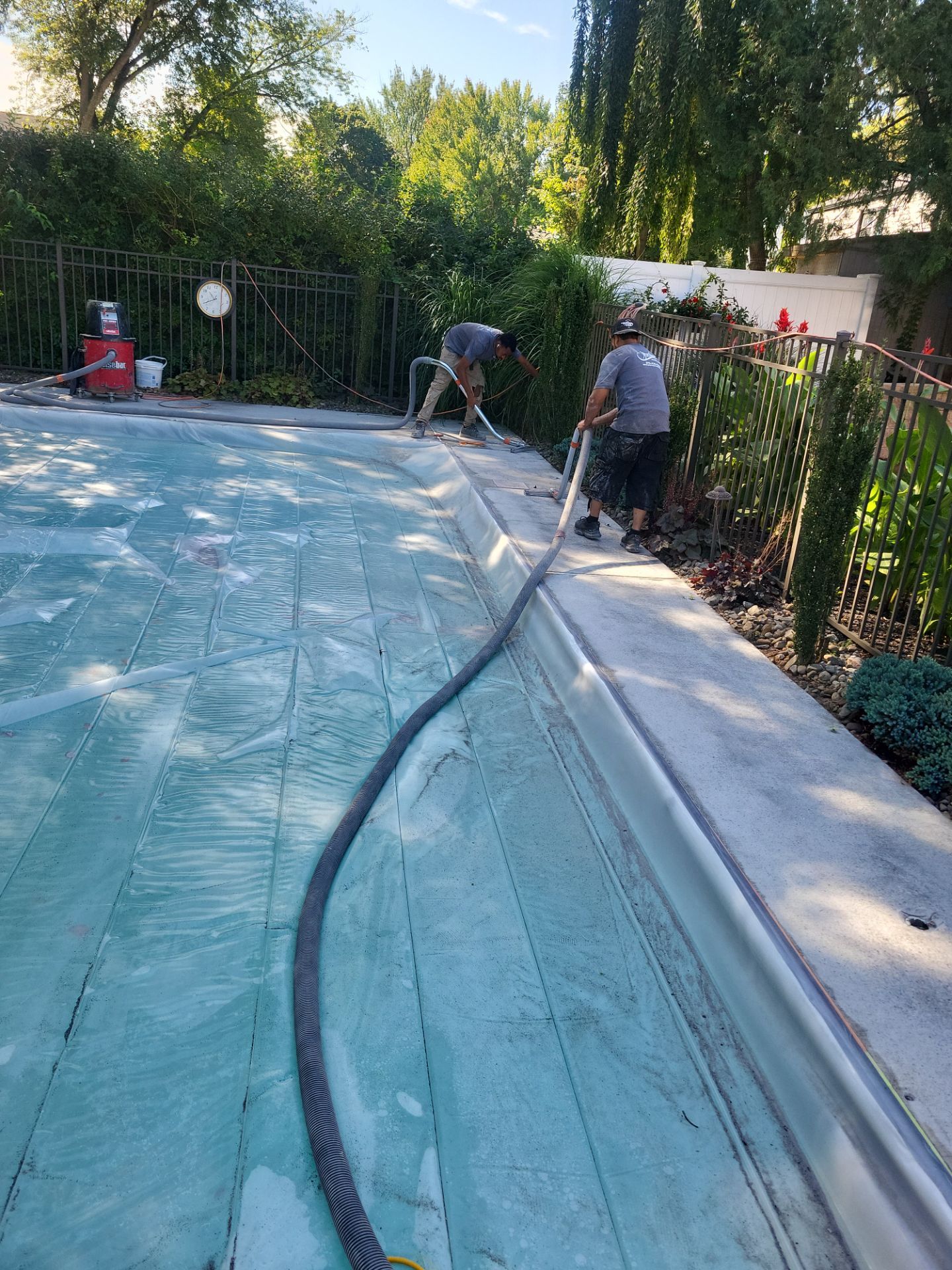 Blue Granite Pool Patio Concrete Coating in Lincoln Park by Spectrum Painting, LLC