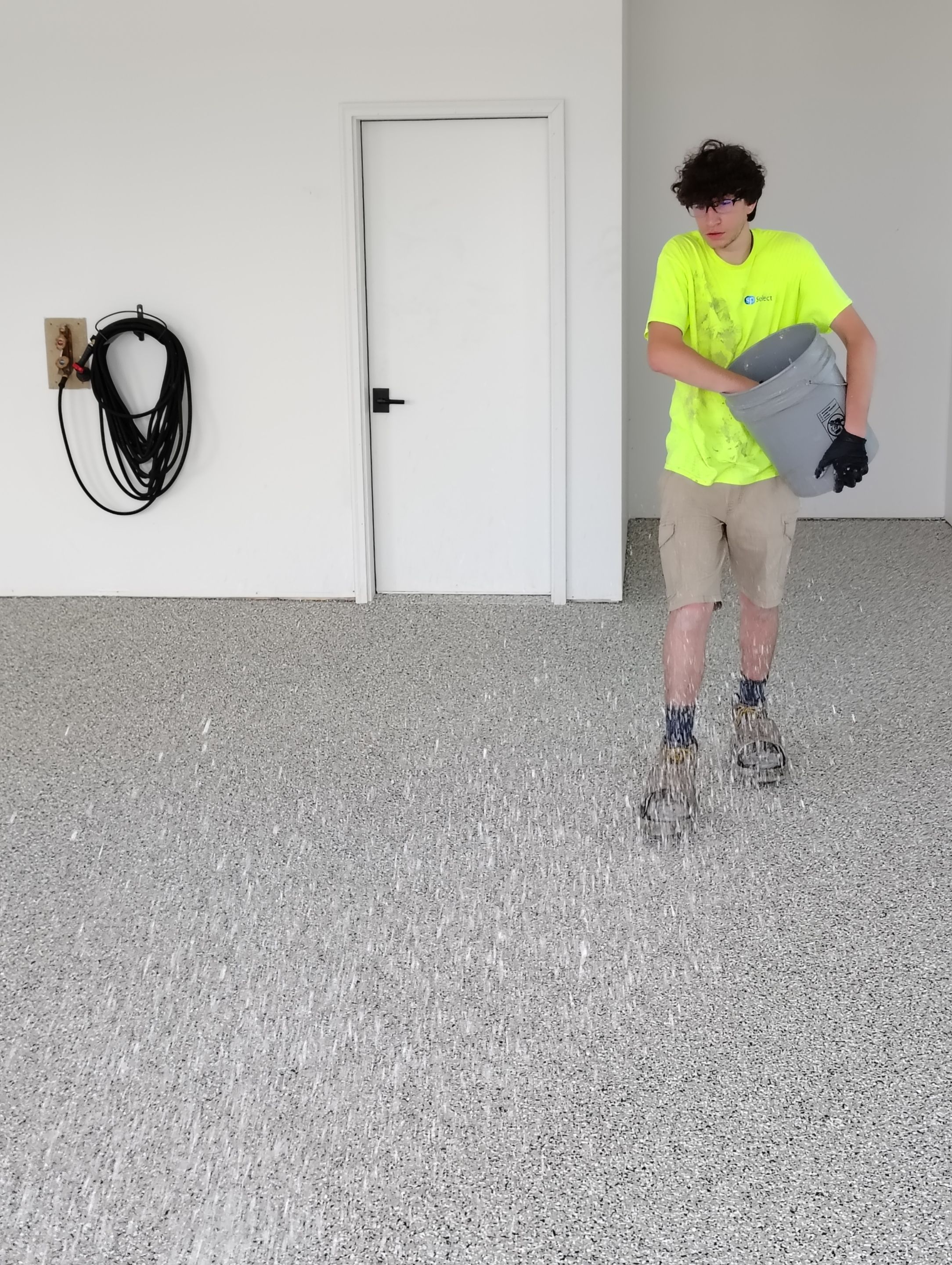 Gray and White Speckled Epoxy Garage Floor Coating in Tea by Select Painting, Coatings & Garage Cabinets