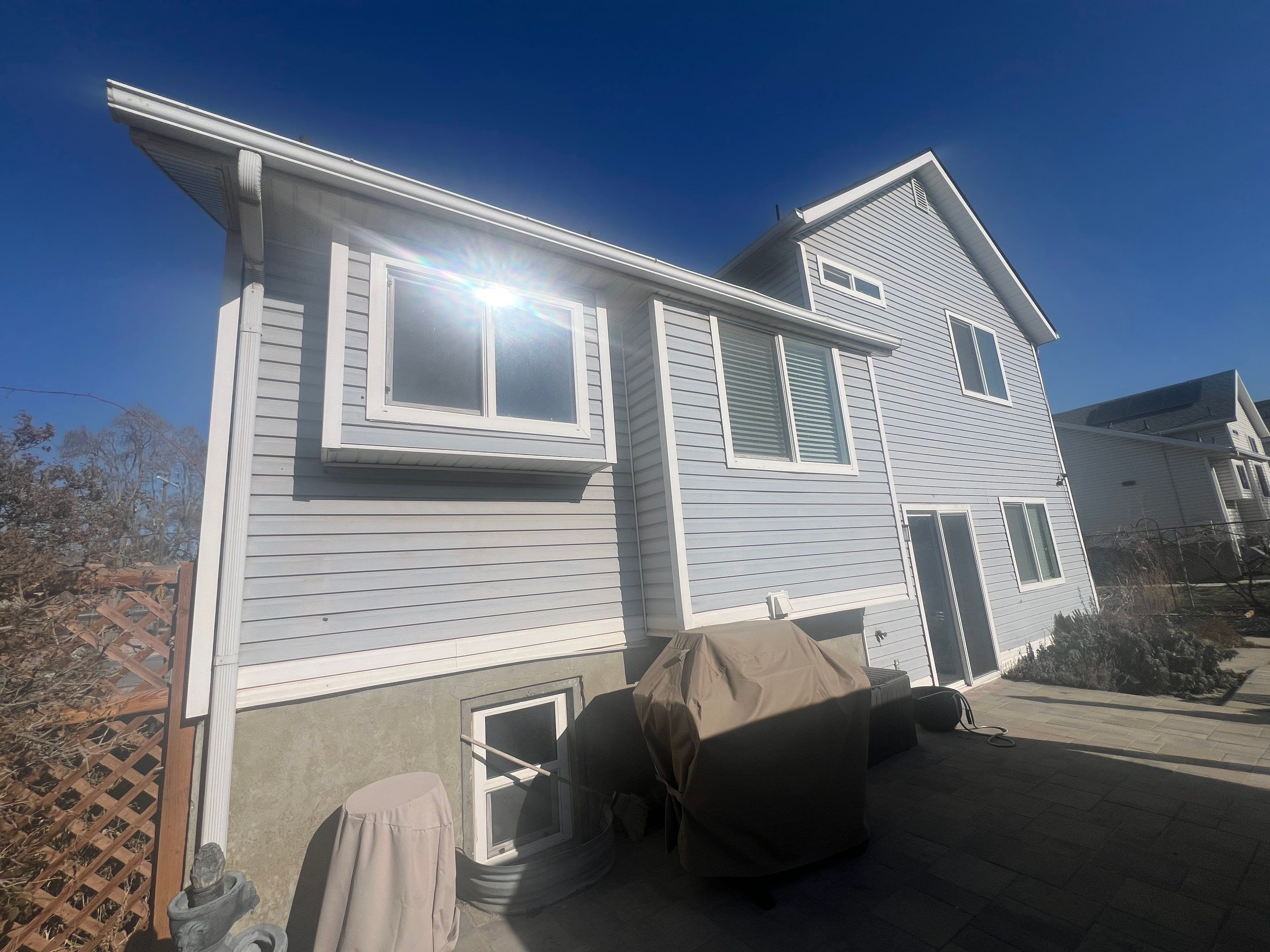 Salt Lake City | Premium Insulated Vinyl & Mixed Materials | Crisp White & Black by Ideal Siding Utah