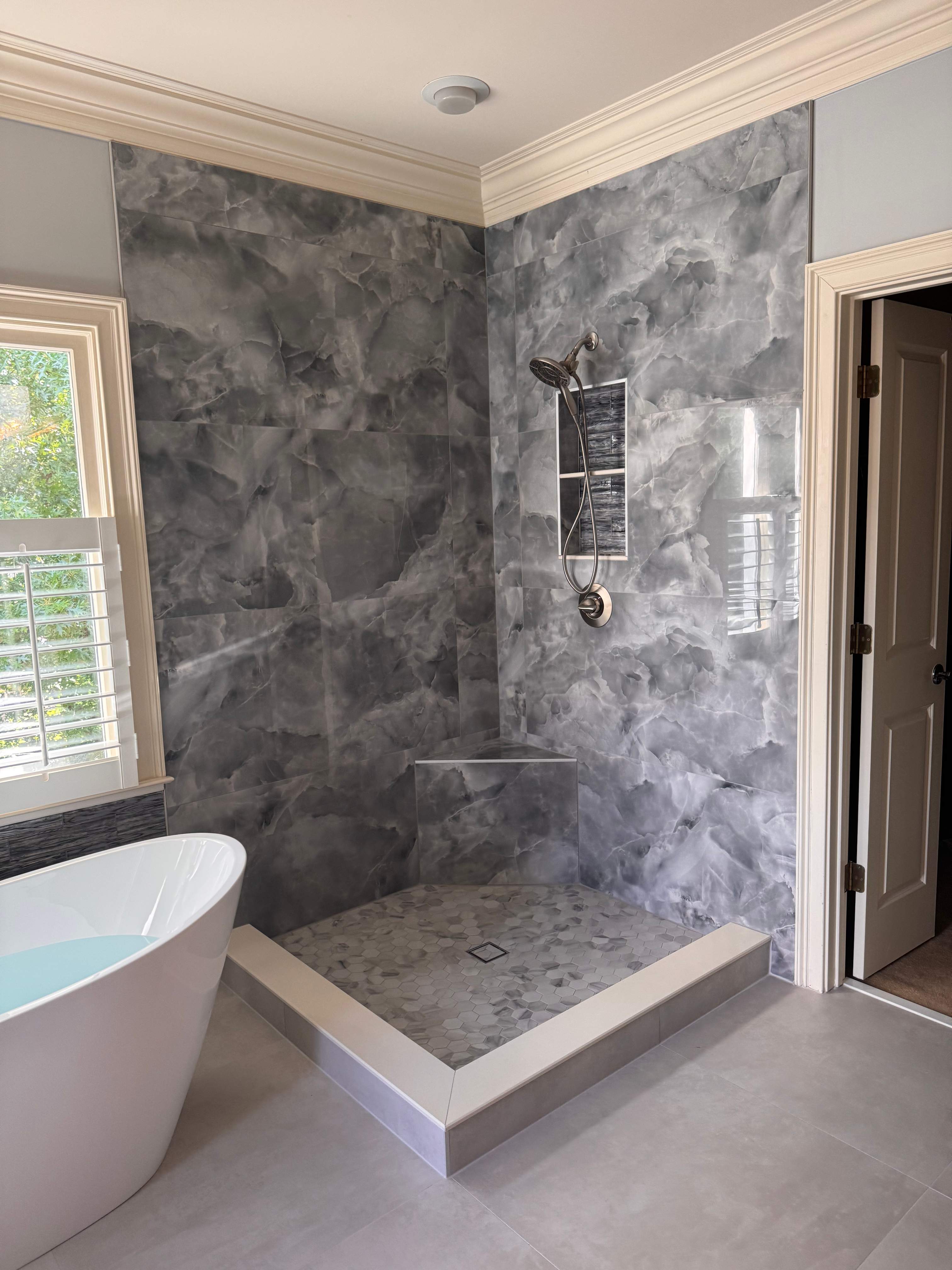 Master bathroom renovation using Free standing tub by Prudencio