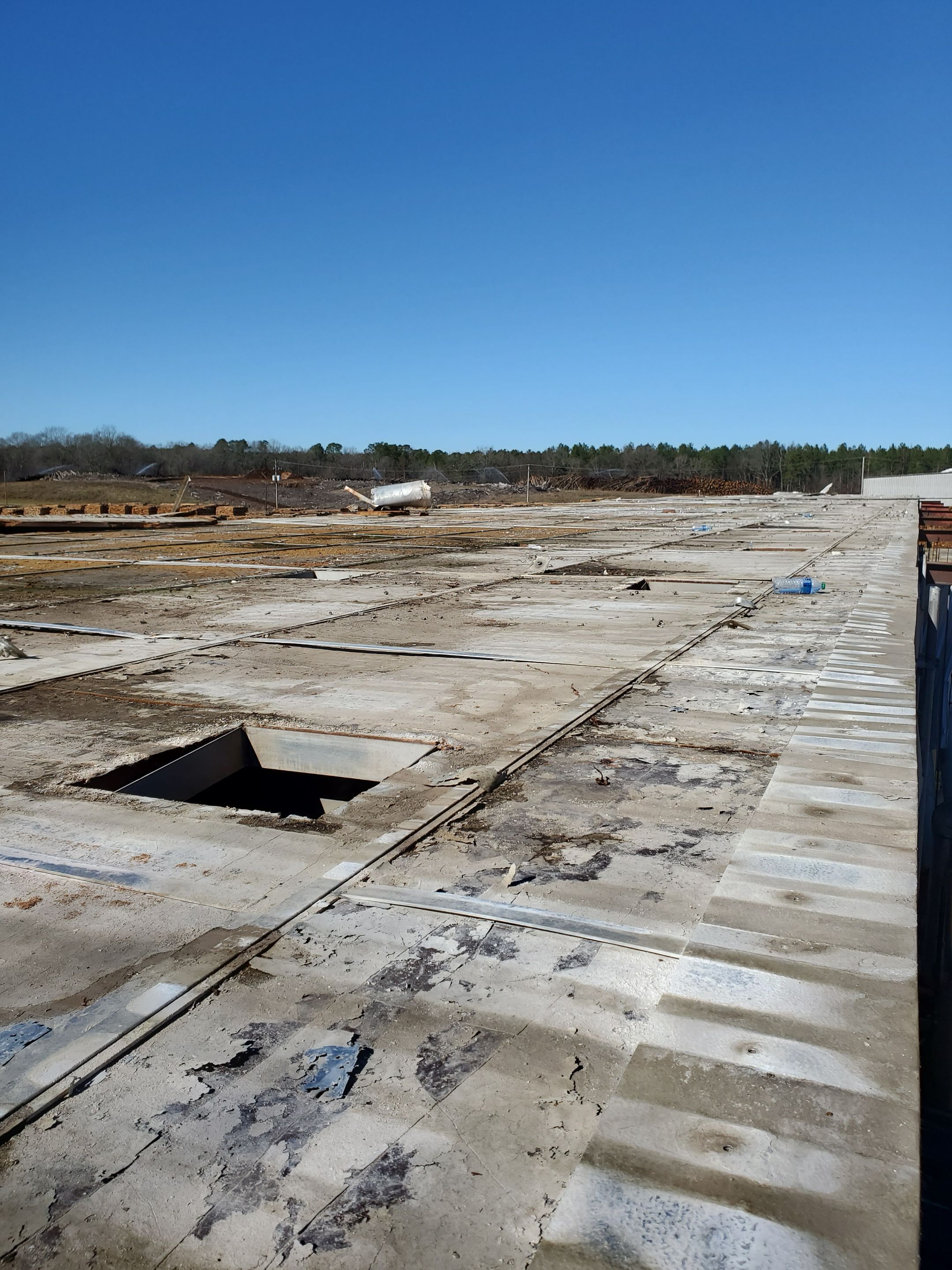 Commercial Roofing Installation using Aluminum Roofing panels by Hostetler Roofing