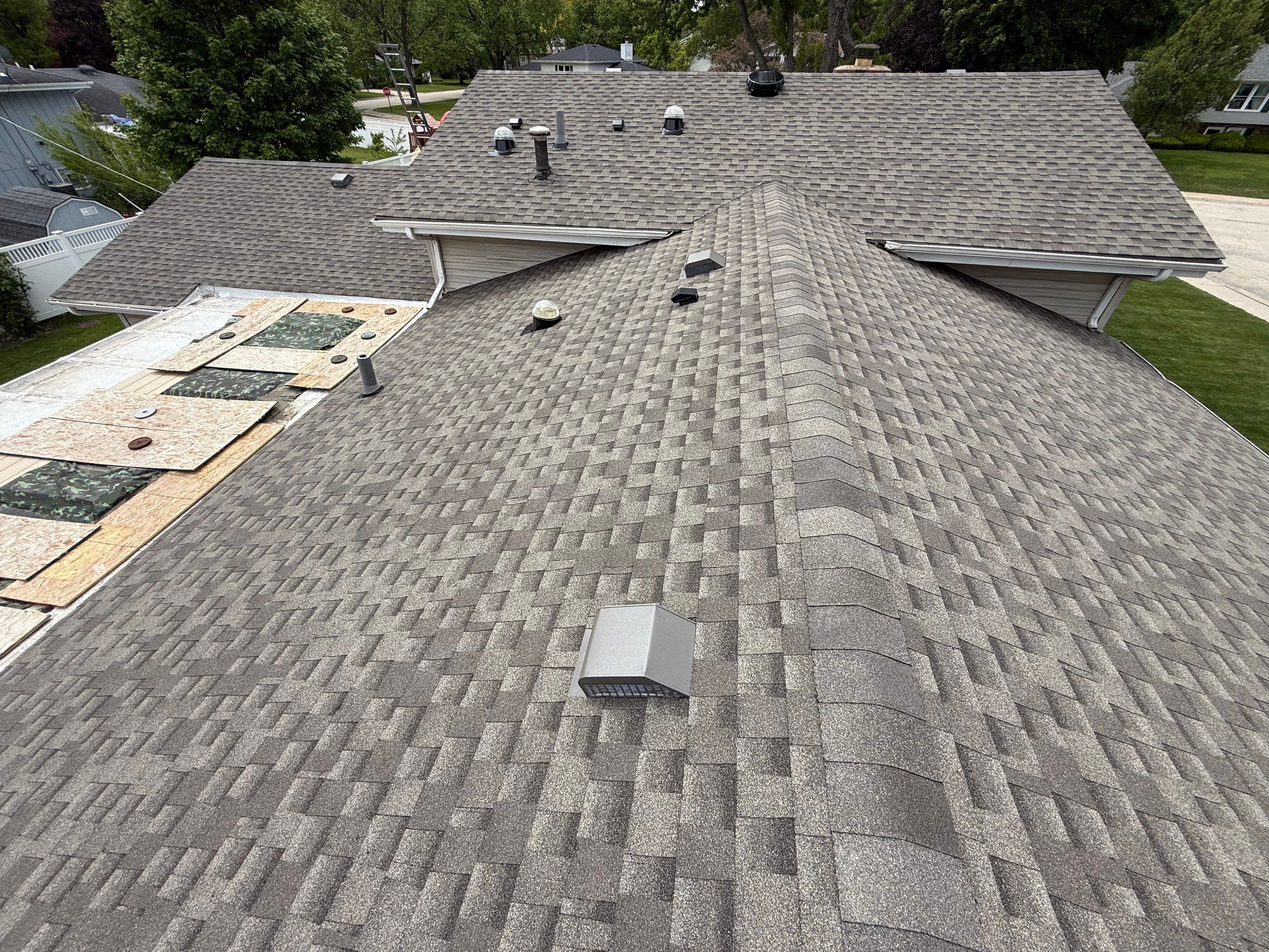 Roof, gutters, windows & siding replacement by Optimal Home Improvement 