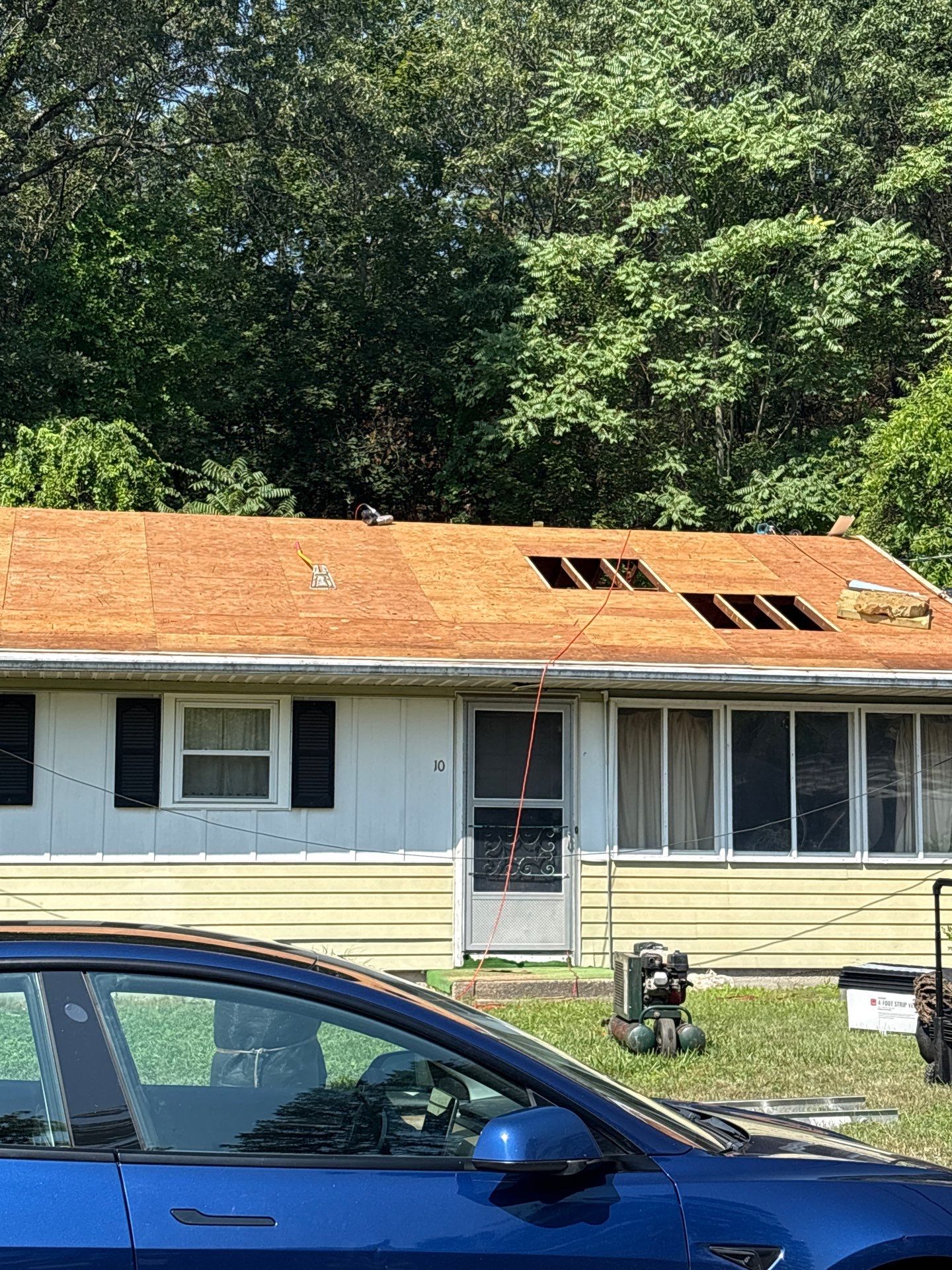 Onyx Black Roof Transformation in Maynard, MA by Mighty Dog Roofing of Greater Middlesex County