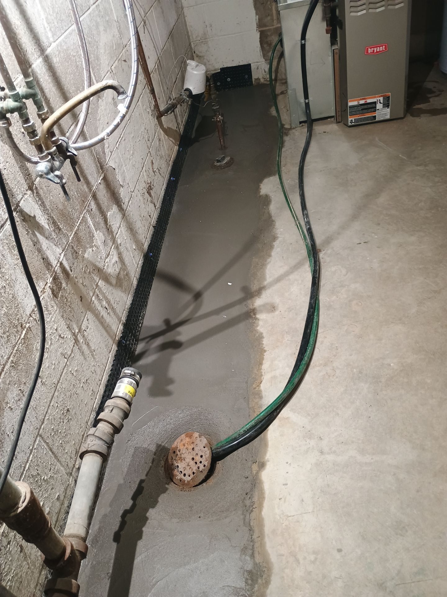 Interior Drain Tile Installation near Columbia Heights, MN by Waterproofing Northeast