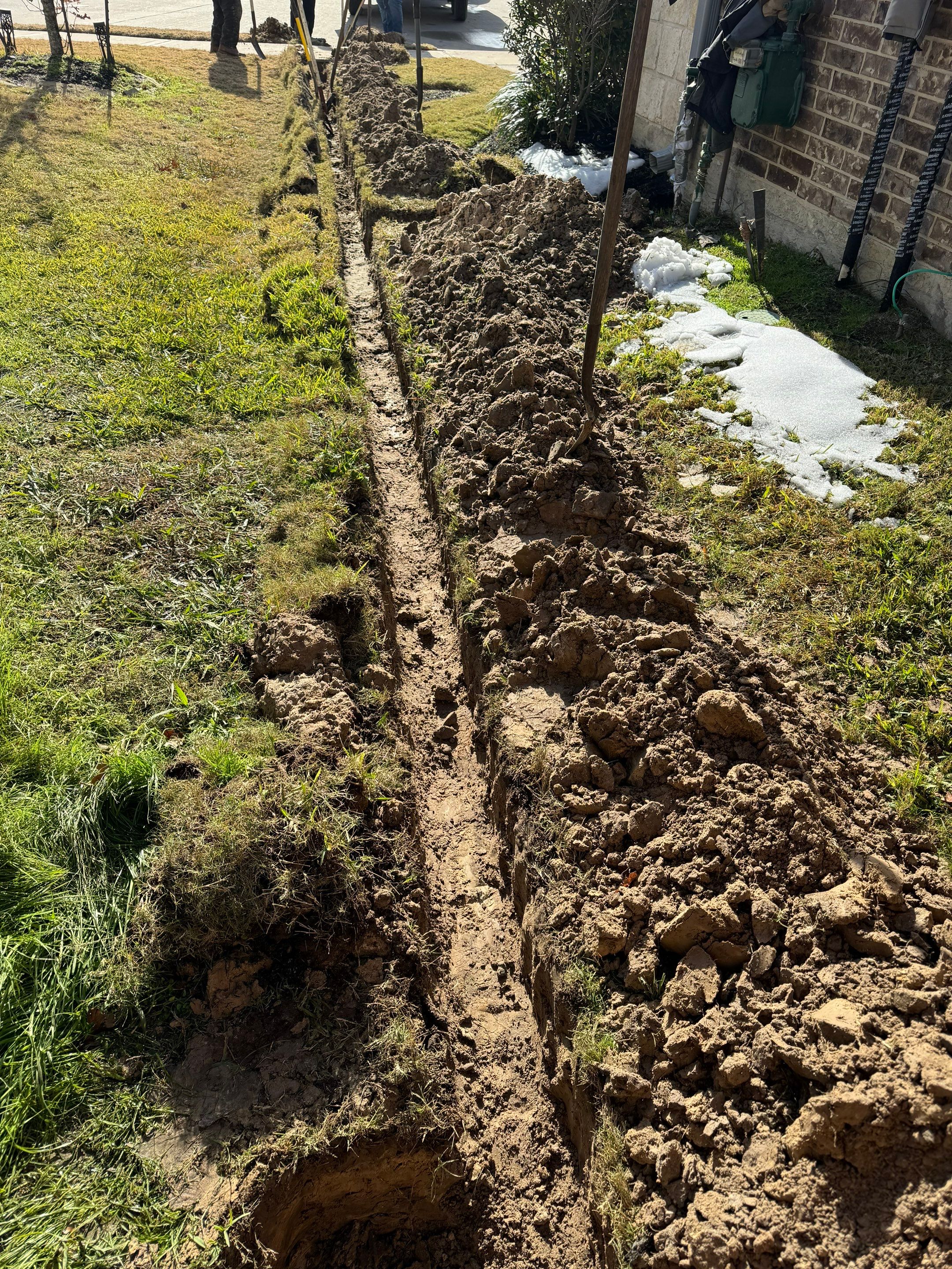 🌿✨ Darlene & Andrew’s Amazing Curb Appeal Transformation  Some projects are more than just landscaping—they’re a conversion of curb appeal from the ground up. For Darlene & Andrew, Alejandro and the Texas Urban Team designed and delivered a complete solution that reshaped their flower beds, solved drainage challenges, and gave new life to the sideyard.  💡 From planning to execution, every step was tailored to build both beauty and functionality:  🌸 Flower Beds, Reinvented  Demolition of old beds, plants, and mulch.  Fresh soil preparation, weed protection, and a brand-new retainer wall built with hand-cut stone and decorative caps.  Carefully selected plants and garden mix to ensure health and visual harmony.  💧 Drainage & Irrigation Upgrades  Outdated corrugated pipes replaced with PVC drainage lines to carry water safely away from the foundation.  New irrigation system combining drip lines and sprinklers—watering plants while keeping the house walls protected.  Sideyard drainage extended with catch basins and PVC piping to prevent water pooling and foundation stress.  🚶 Functional Sideyard with Walkway & Trash Area  Graded and leveled sideyard to manage runoff.  Installed a modern gravel and paver walkway for easy access.  Built a firm and tidy concrete-paver pad for trash containers—making the space both practical and polished.  🛠️ Stonework & Craftsmanship  Every stone in the retainer wall was cut, set, and secured by the team of handcrafters, ensuring a durable build that doubles as a design statement.  ✅ Outcome: Darlene & Andrew’s property now has better drainage, a clean and organized sideyard, and elegant new flower beds—all designed for long-term durability and lasting beauty.  📢 Before hiring anyone, review our portfolio. Our work speaks louder than words—each project is a blend of function, protection, and design crafted to last. by Texas Urban Elements