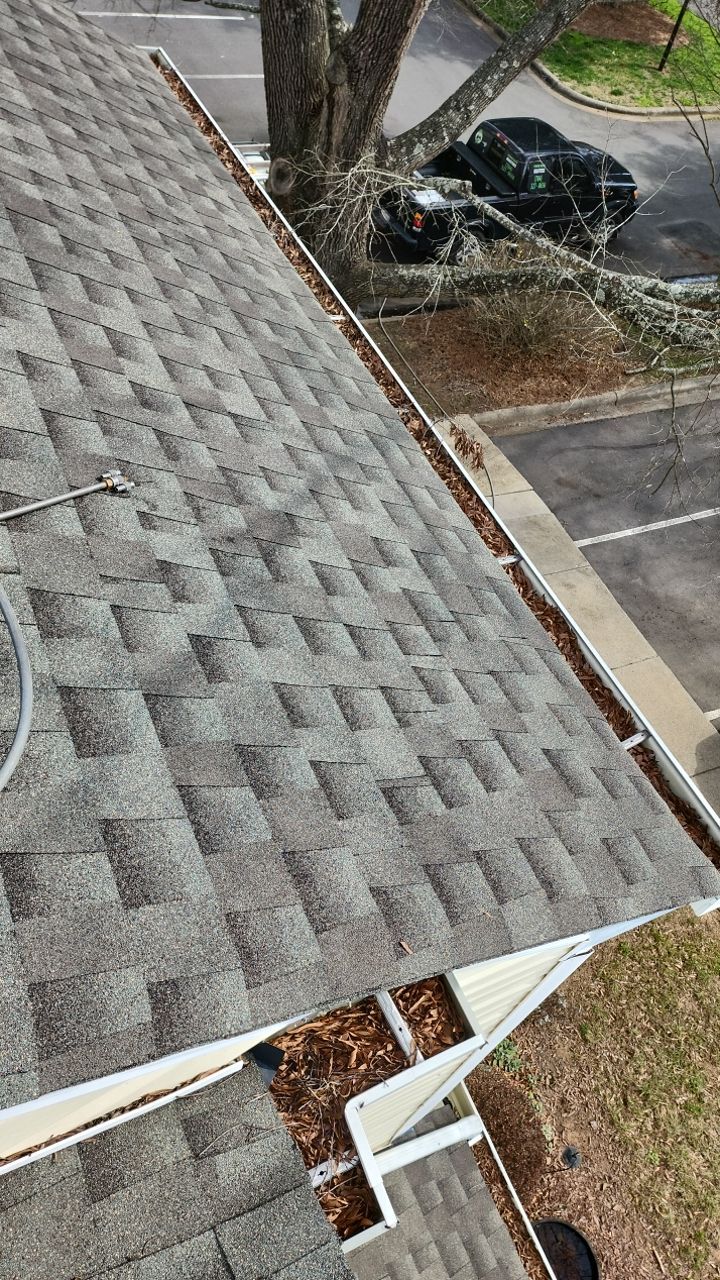 Gutter Cleaning using water by Power Wash Masters LLC
