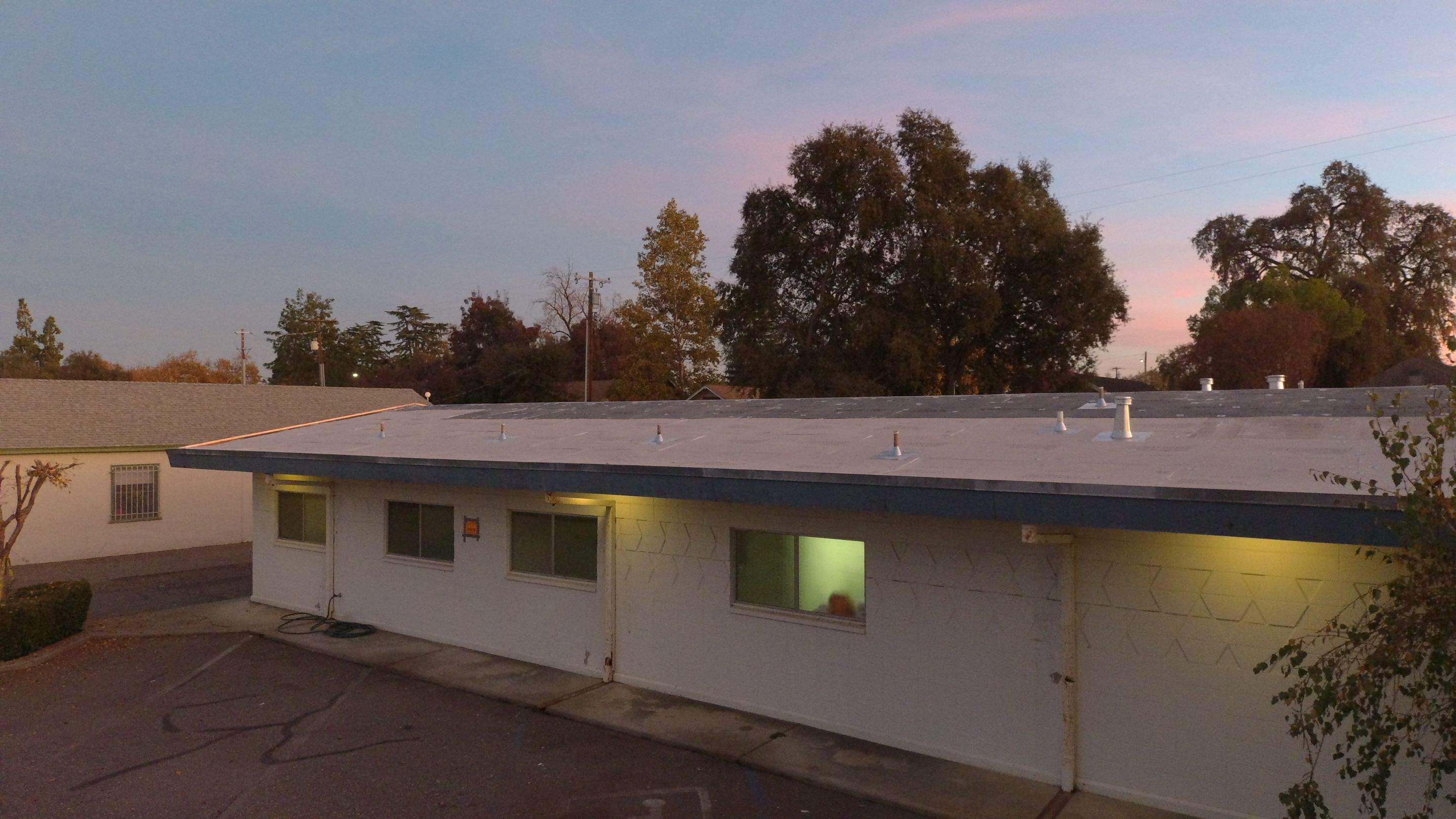 Spray foam and coatings using Conklin Benchmark/PUMA XL coatings and spray foam by Straight Edge Roofing Inc