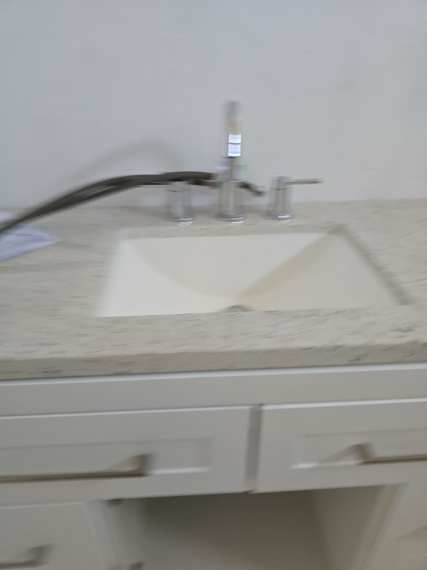 Installation of New Cap for Water Heater, Under-Sink Plumbing, and New Toilet by Us Plumbing