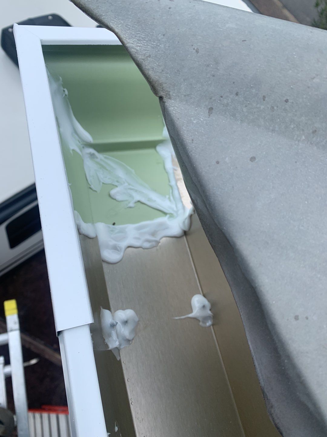 Seamless Gutter Installation Using White K-Style Gutters by Gutter Professors