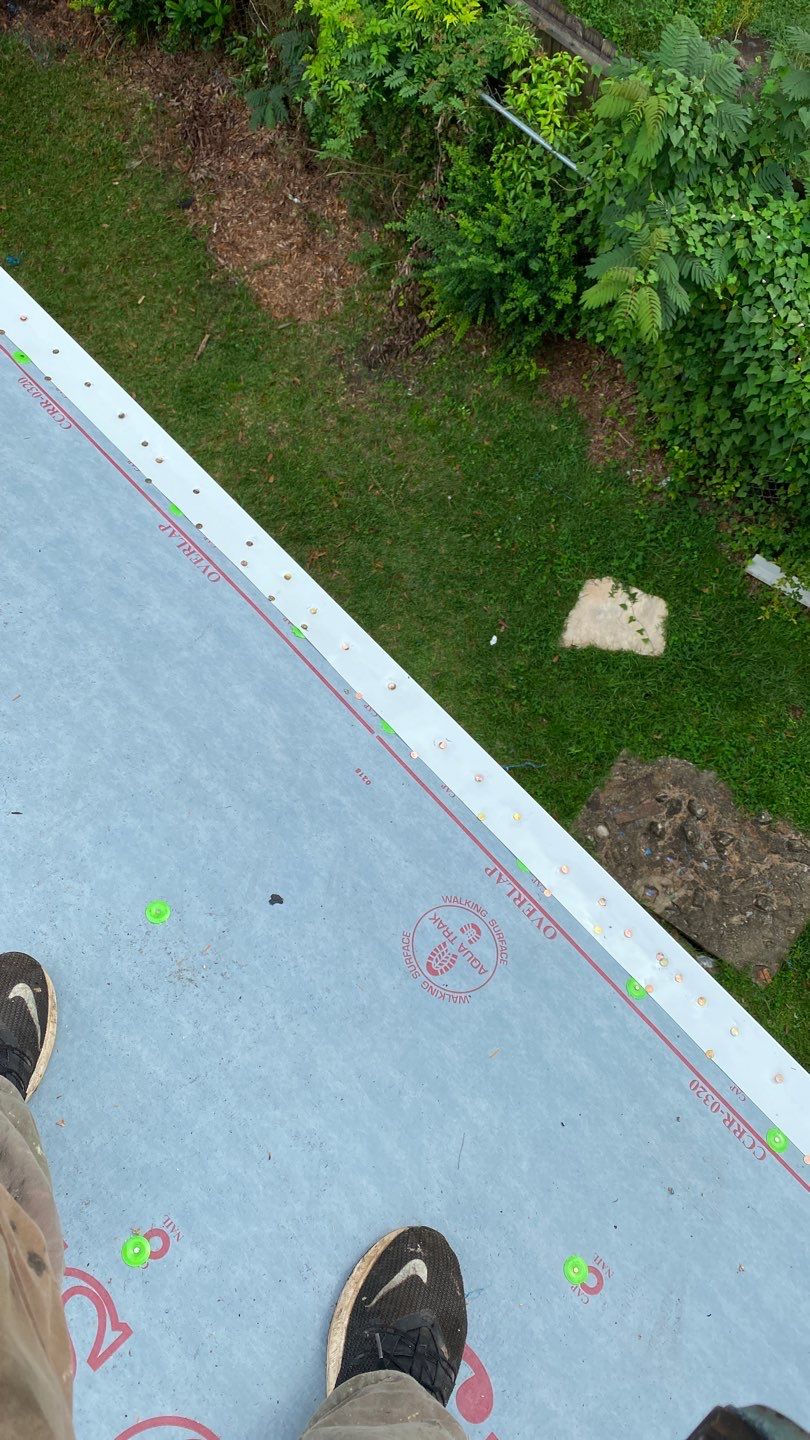 Commercial Roofing Installation using Roof Replacement by American Roofing & Construction LLC